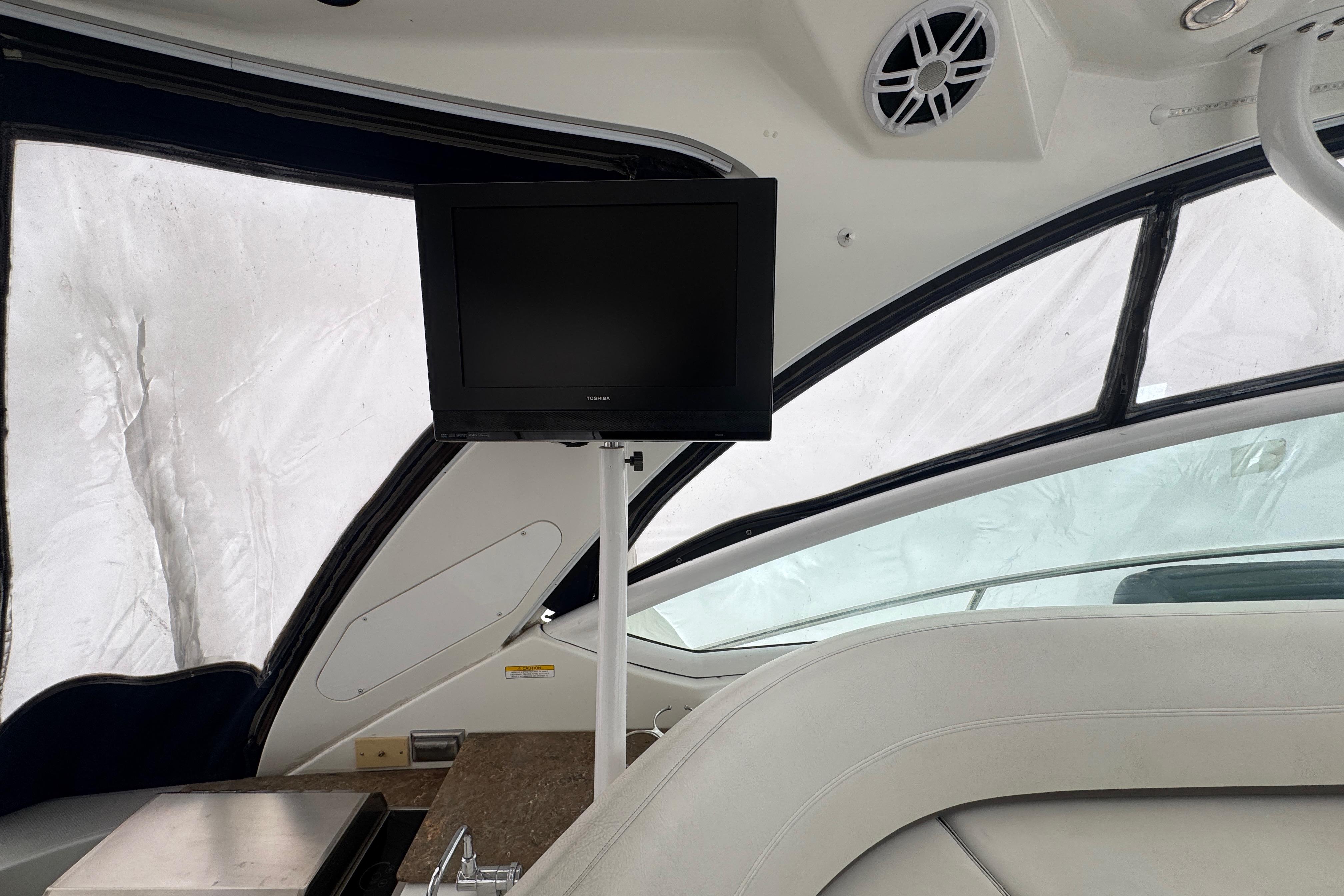 2008 Cruisers Yachts 360 Express interior with TV and seating area.