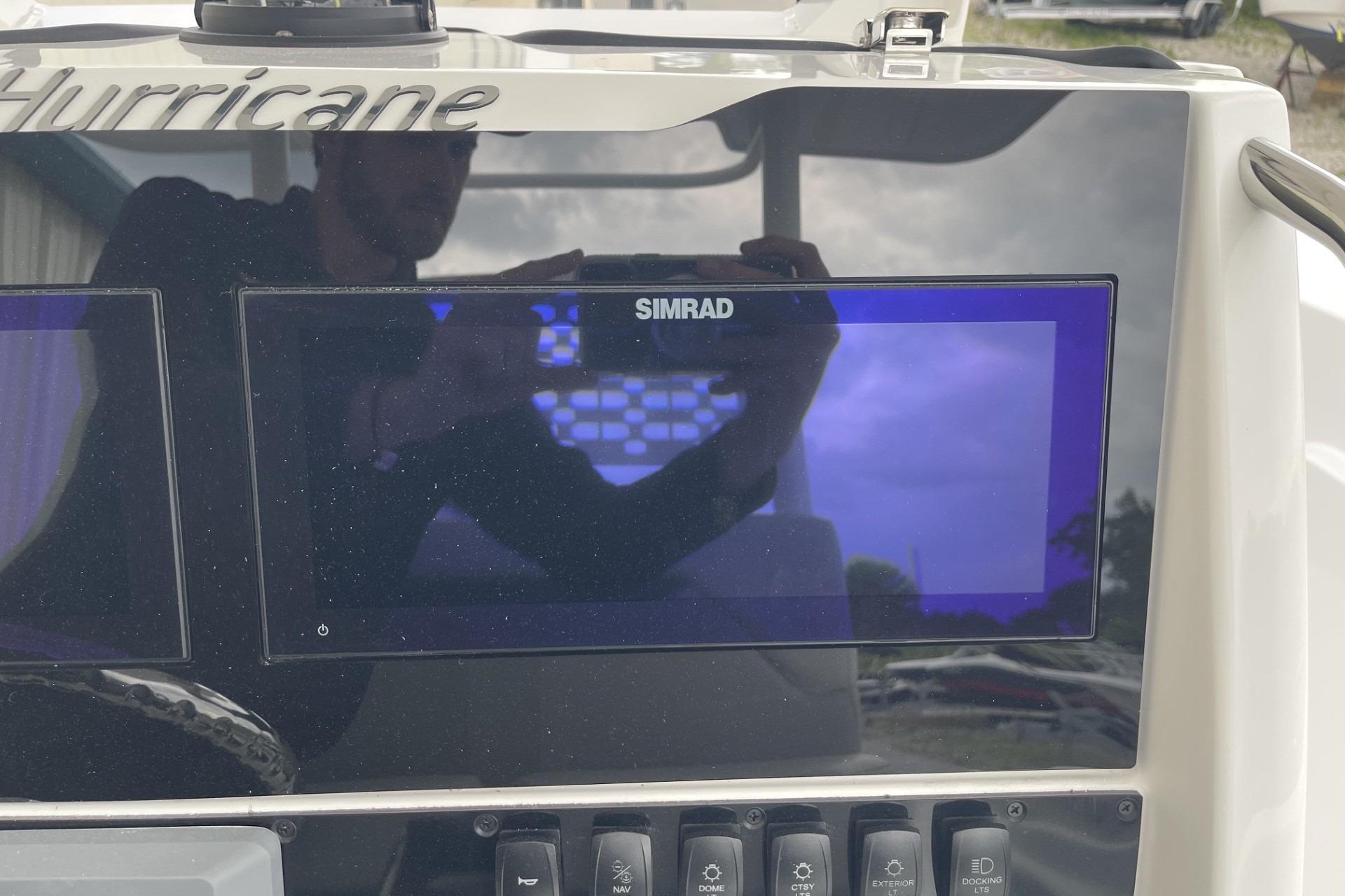 Simrad display on 2026 Hurricane Center Console 24 OB boat dashboard.