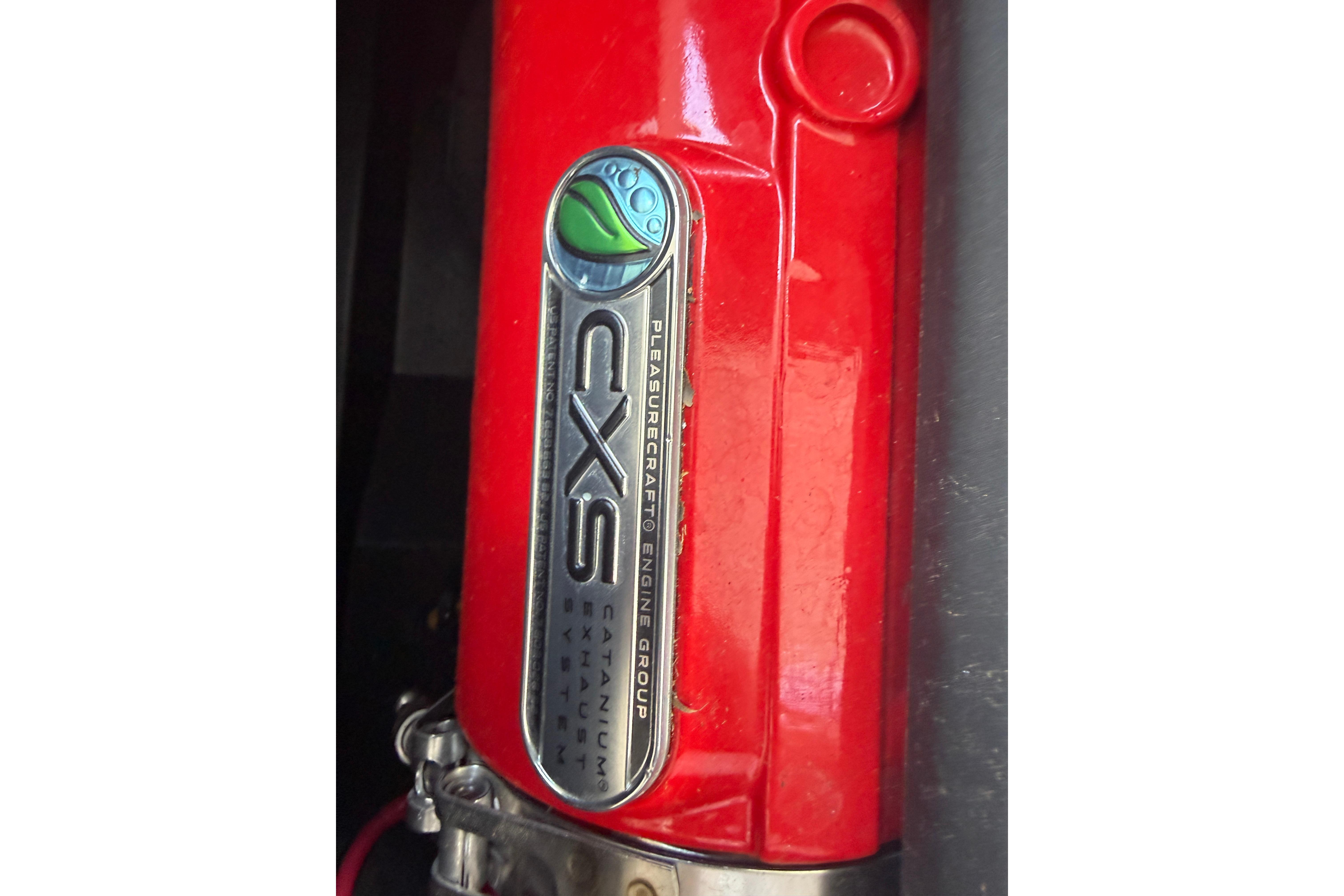 Red engine component of 2024 Nautique Super Air Nautique GS20 with CXS branding.