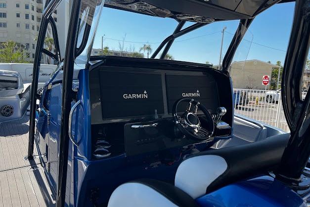 2022 Nor-Tech 390 Sport Center Console with Garmin navigation displays and sleek interior design.
