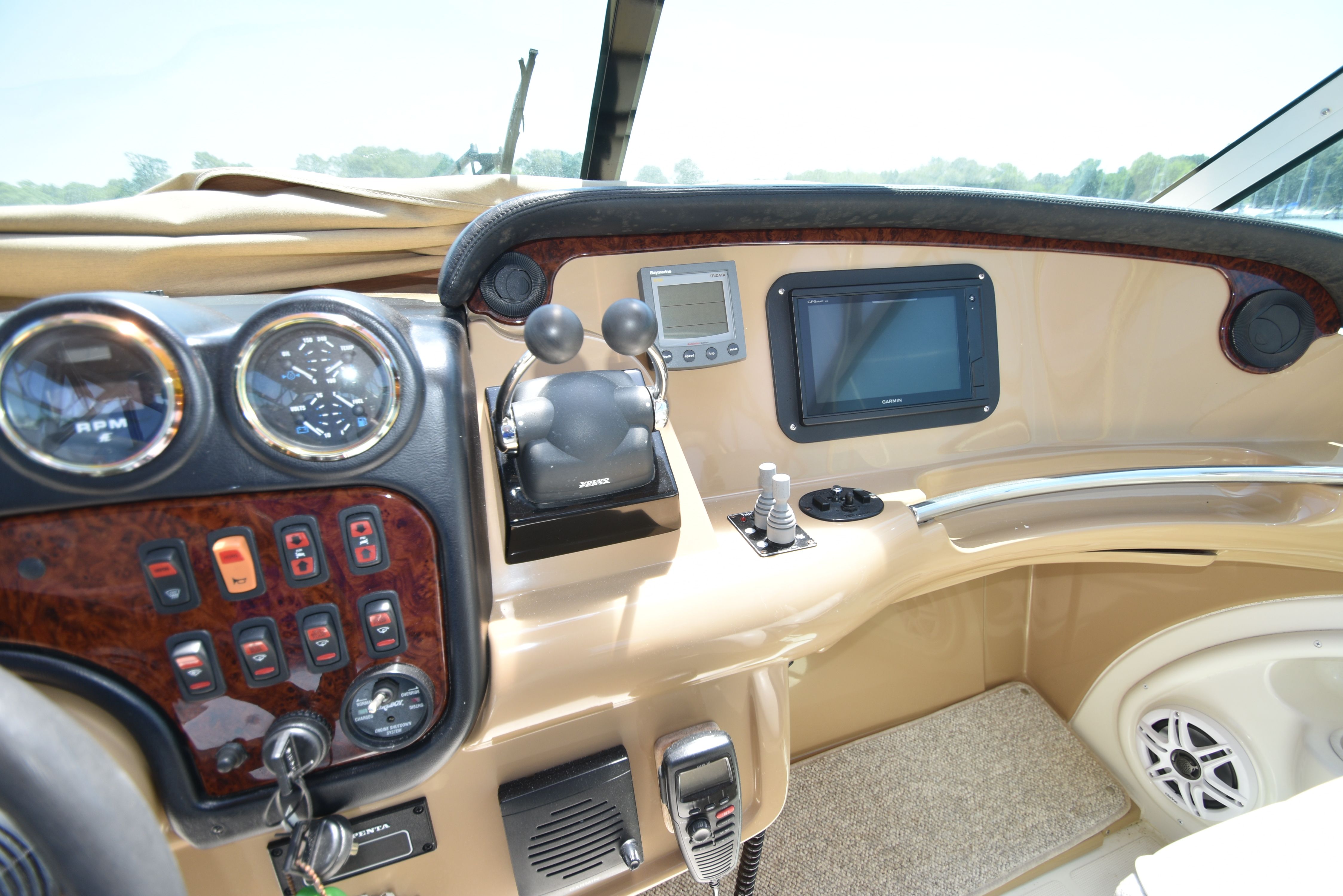 The cockpit of a 2004 Carver 466 Motor Yacht with controls and instruments.