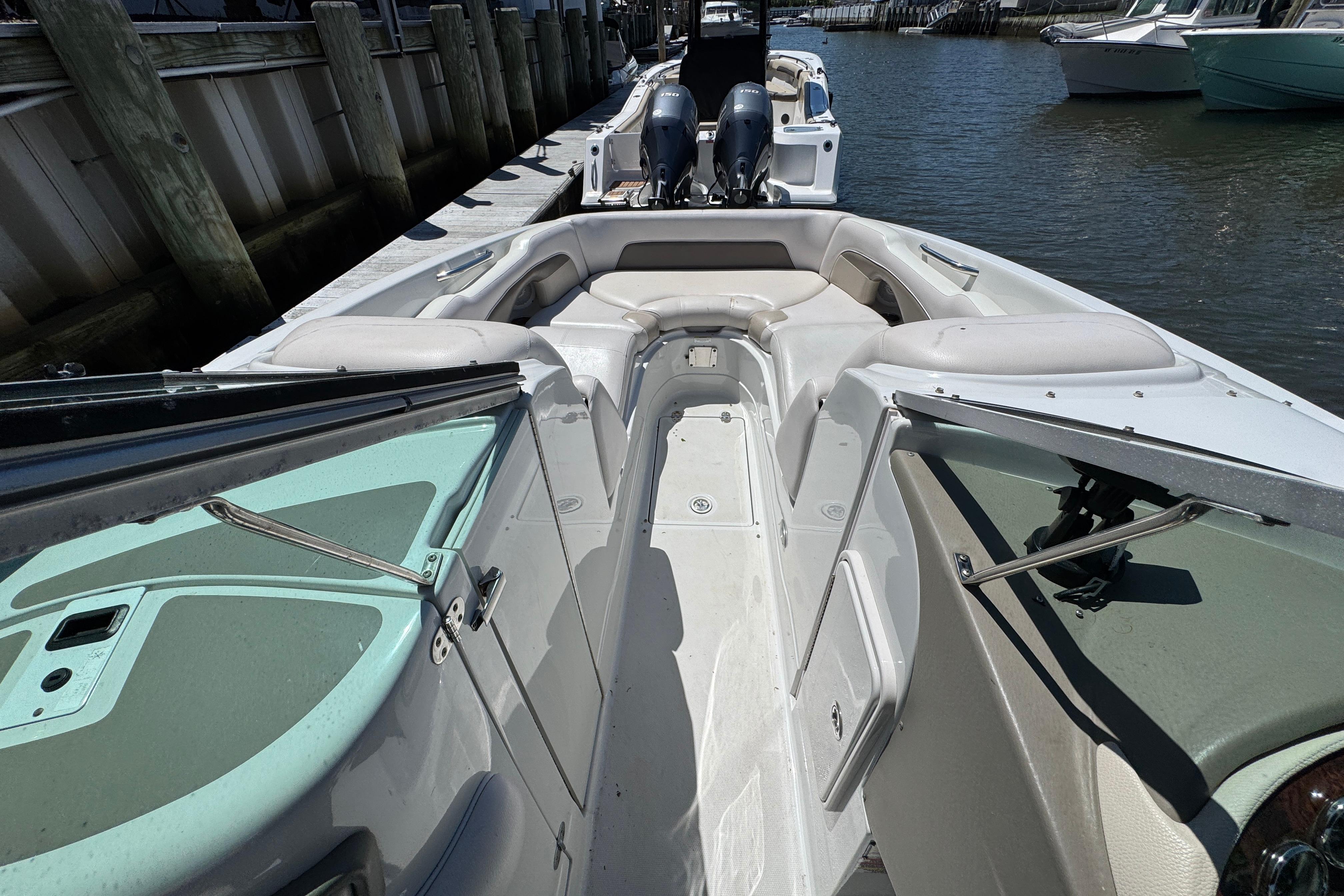 2013 Crownline Eclipse E6 XS boat interior with spacious seating and sleek design.