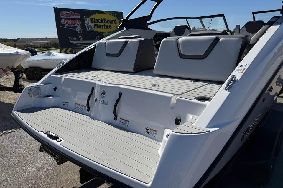 2026 Yamaha Boats AR250 rear view with spacious deck and seating.
