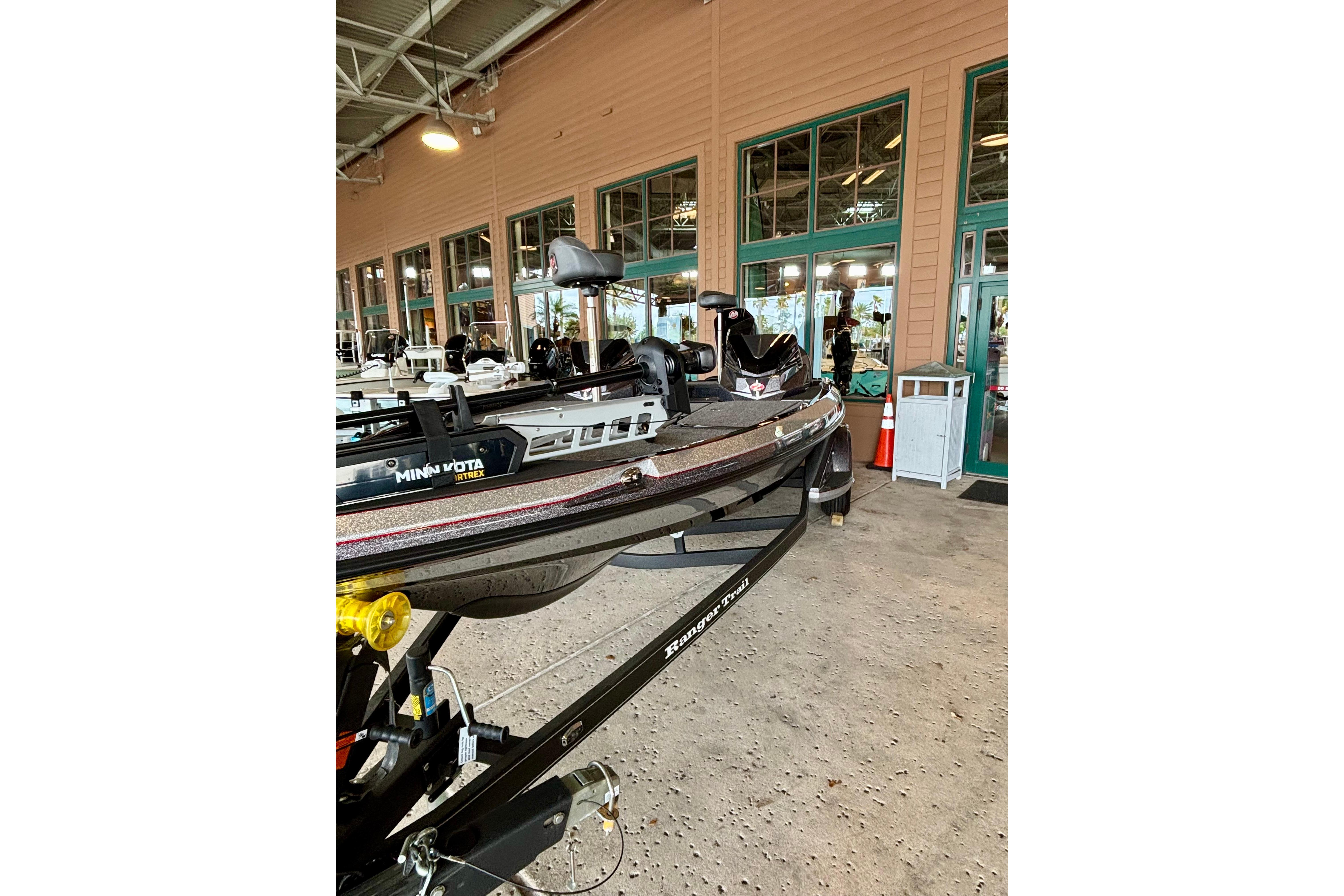 2025 Ranger Z519R boat displayed indoors with Minn Kota trolling motor.