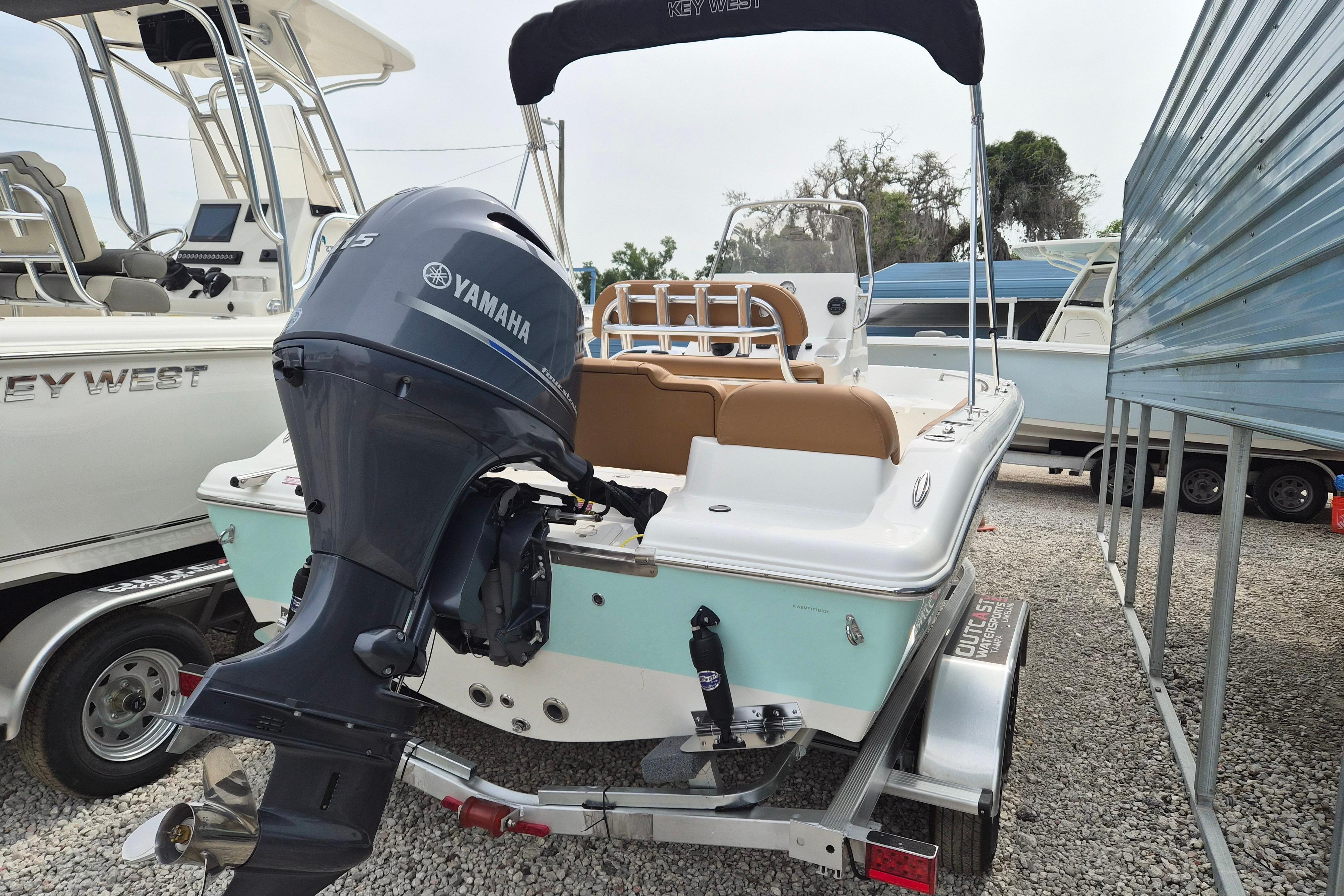 2026 Key West 189 FS boat with Yamaha engine on trailer, parked outdoors.