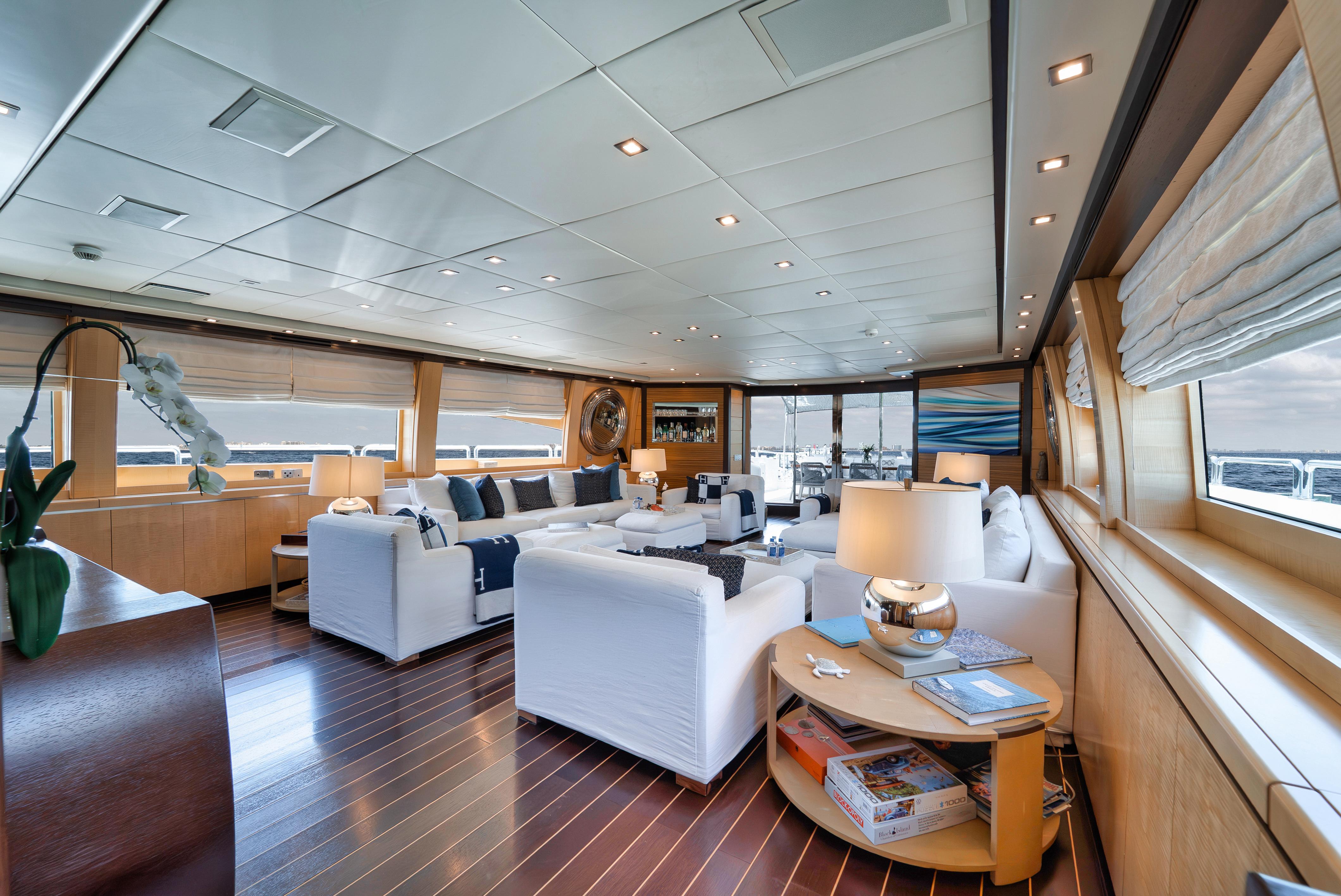 Luxurious interior of 2010 Arno Leopard 46 yacht with elegant seating and modern decor.