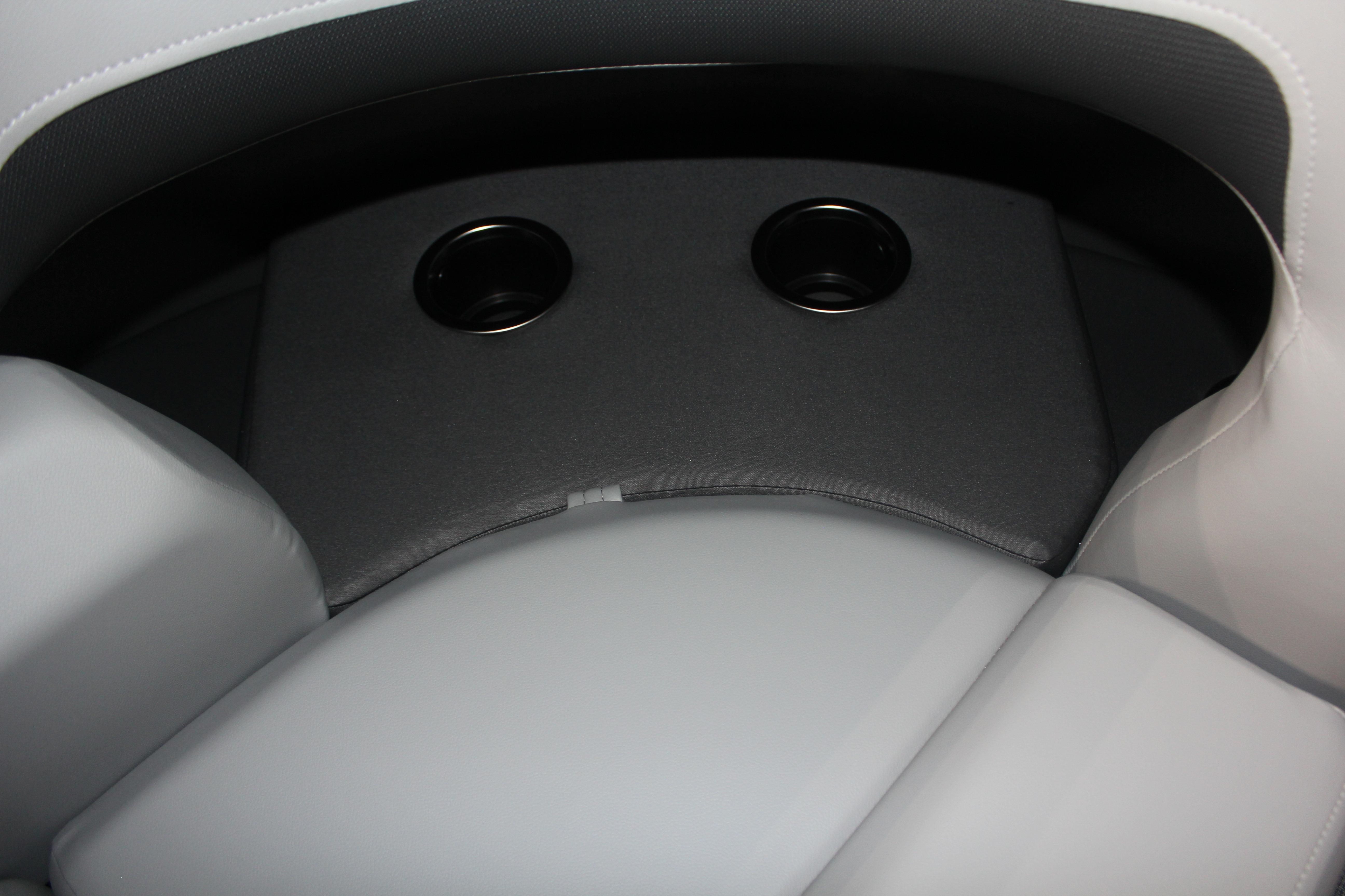 2026 Sun Tracker Party Barge 22 DLX interior seating with cup holders.