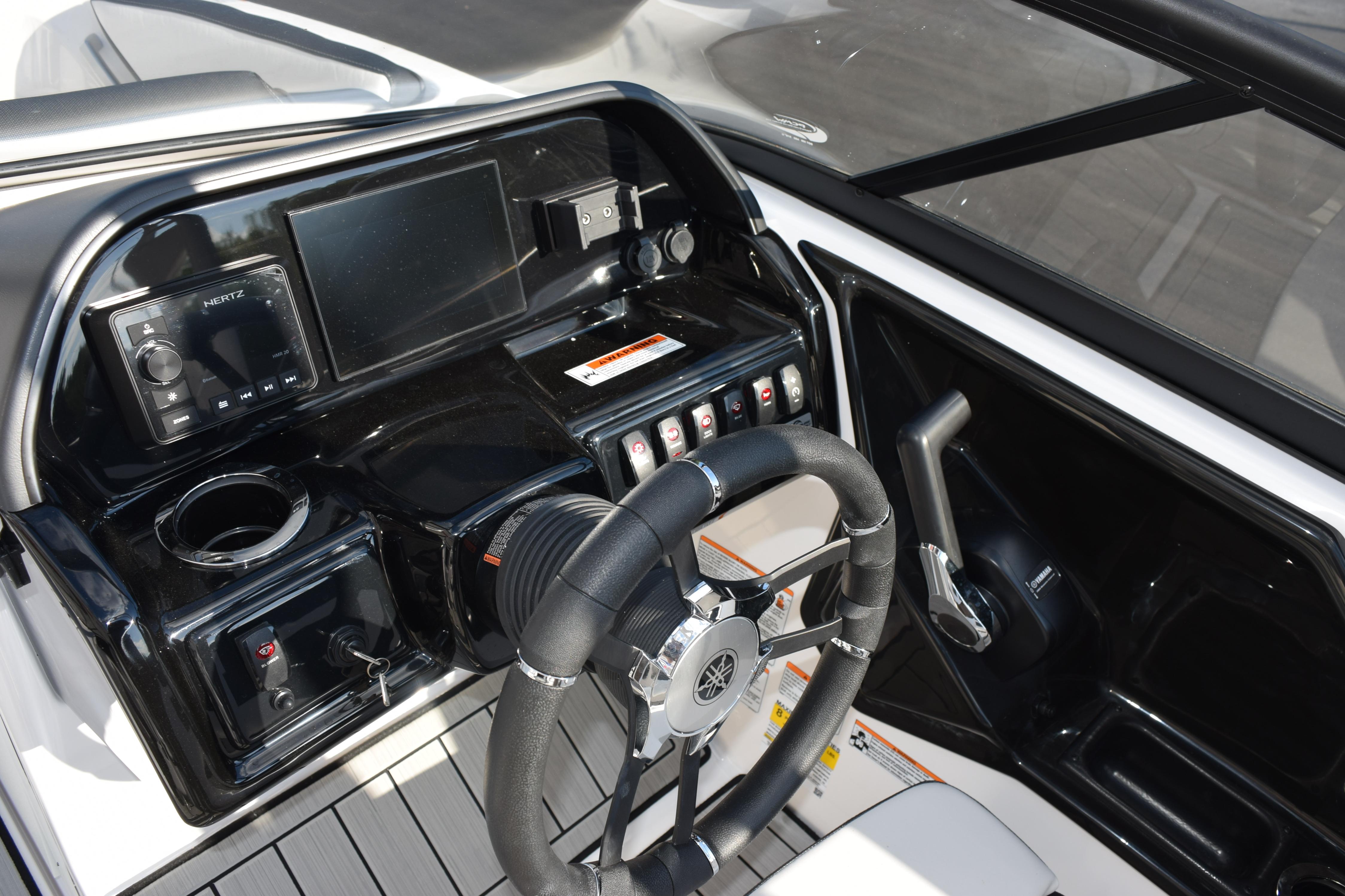 2026 Yamaha Boats 195S dashboard with steering wheel and control panel.
