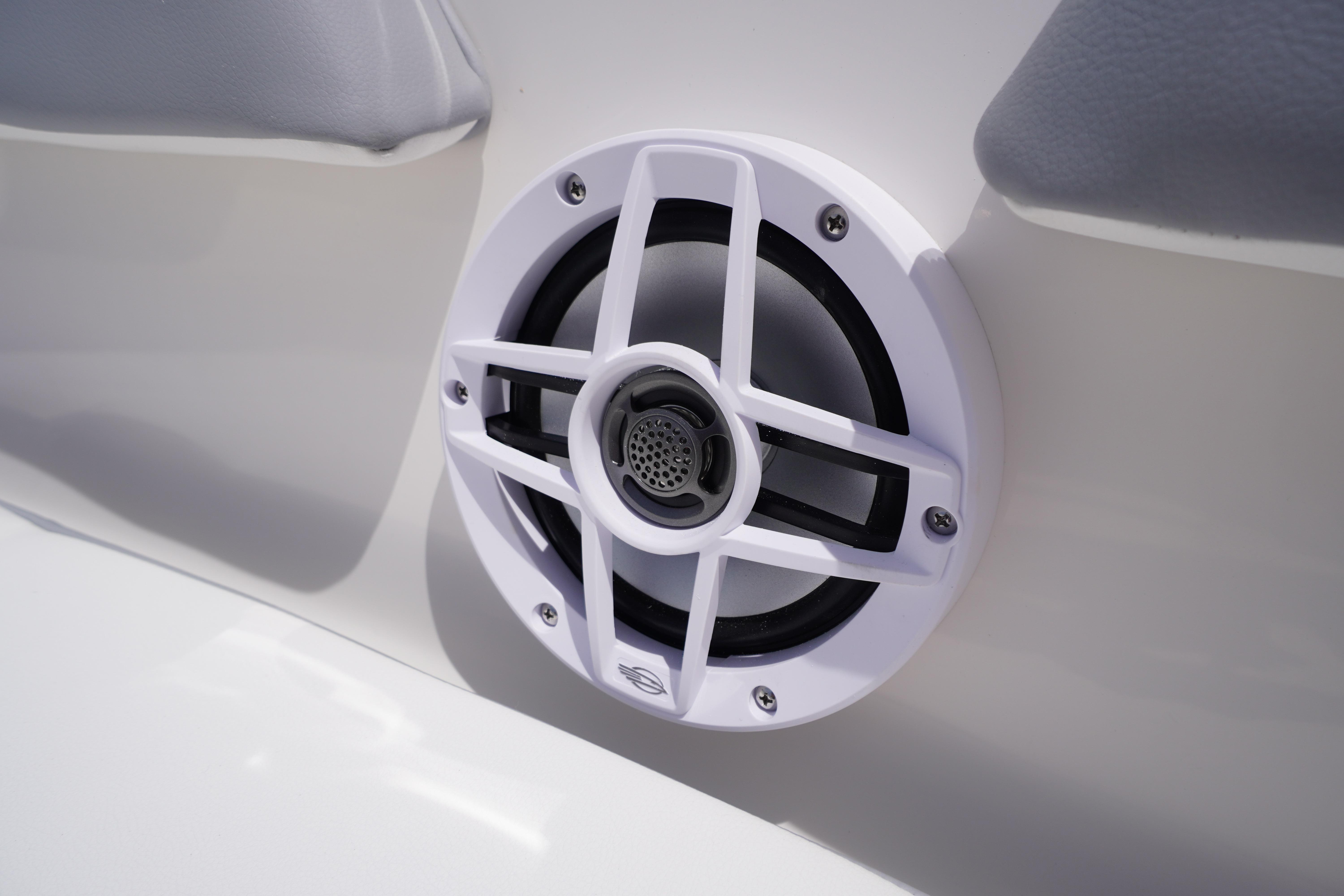 White speaker on 2026 Chaparral 23 SSi OB boat interior.