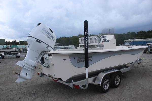 2025 Carolina Skiff 23 LS boat with Suzuki outboard engine on trailer.