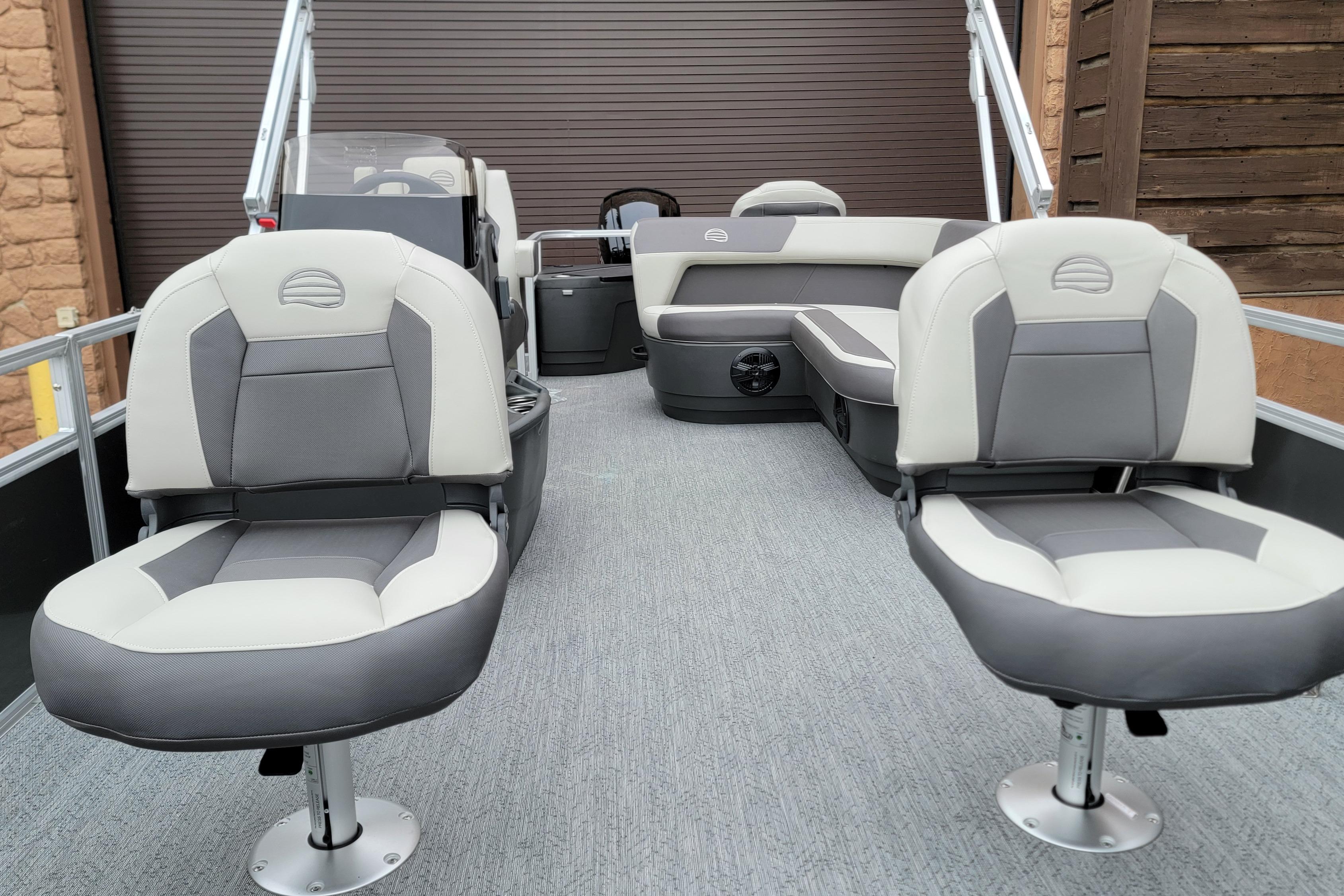 2026 Sun Tracker Bass Buggy 18 DLX pontoon boat interior with gray seating.
