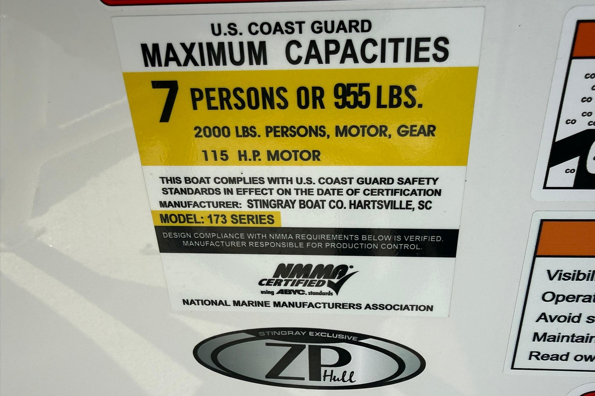 2026 Stingray 173 CC boat capacity label: 7 persons, 955 lbs, 115 HP motor.