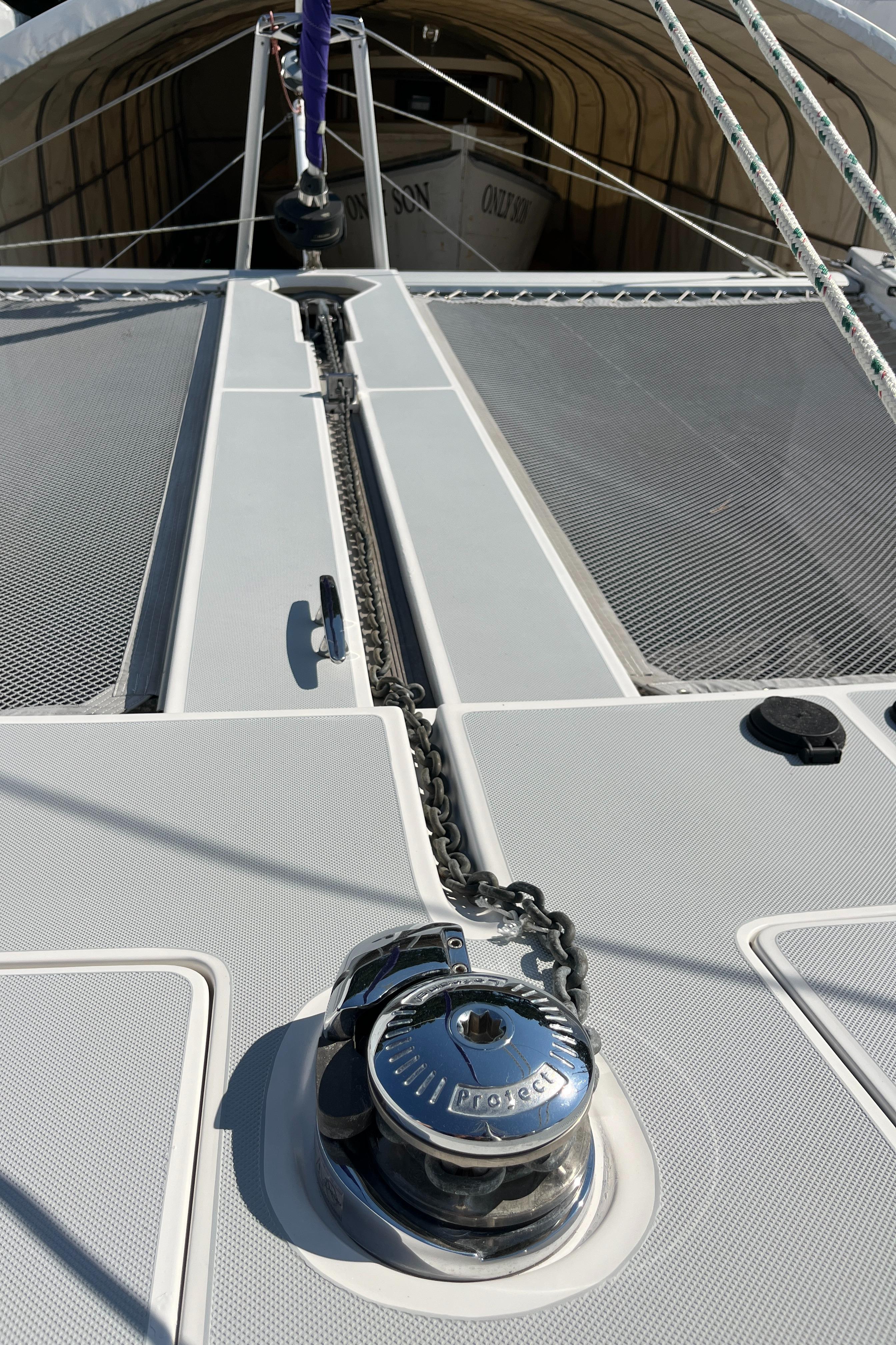 2018 Maine Cat 38 Electric catamaran deck with winch and chain detail.