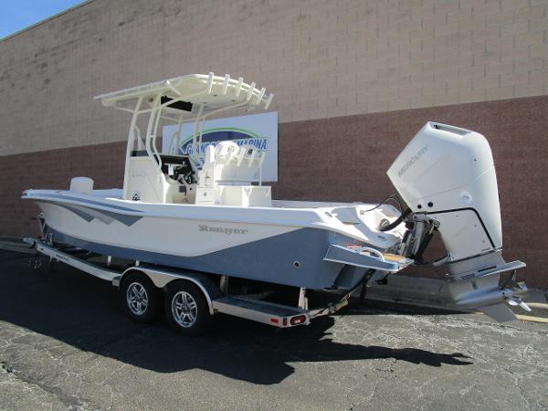 2024 Ranger 2660 Bay boat on a trailer, parked outdoors.