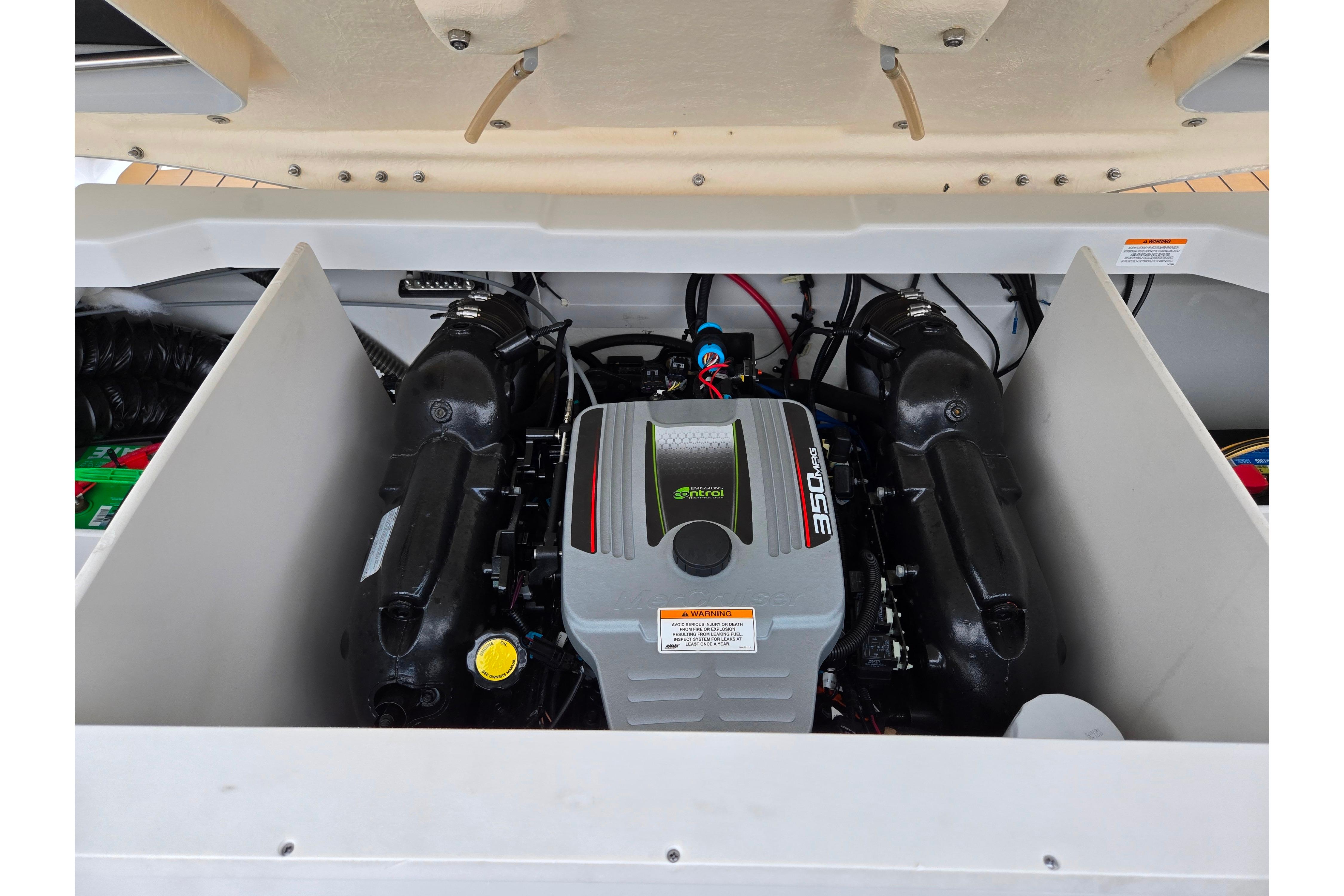 2012 Crownline 235 SS engine compartment showcasing a powerful 350 MAG engine.