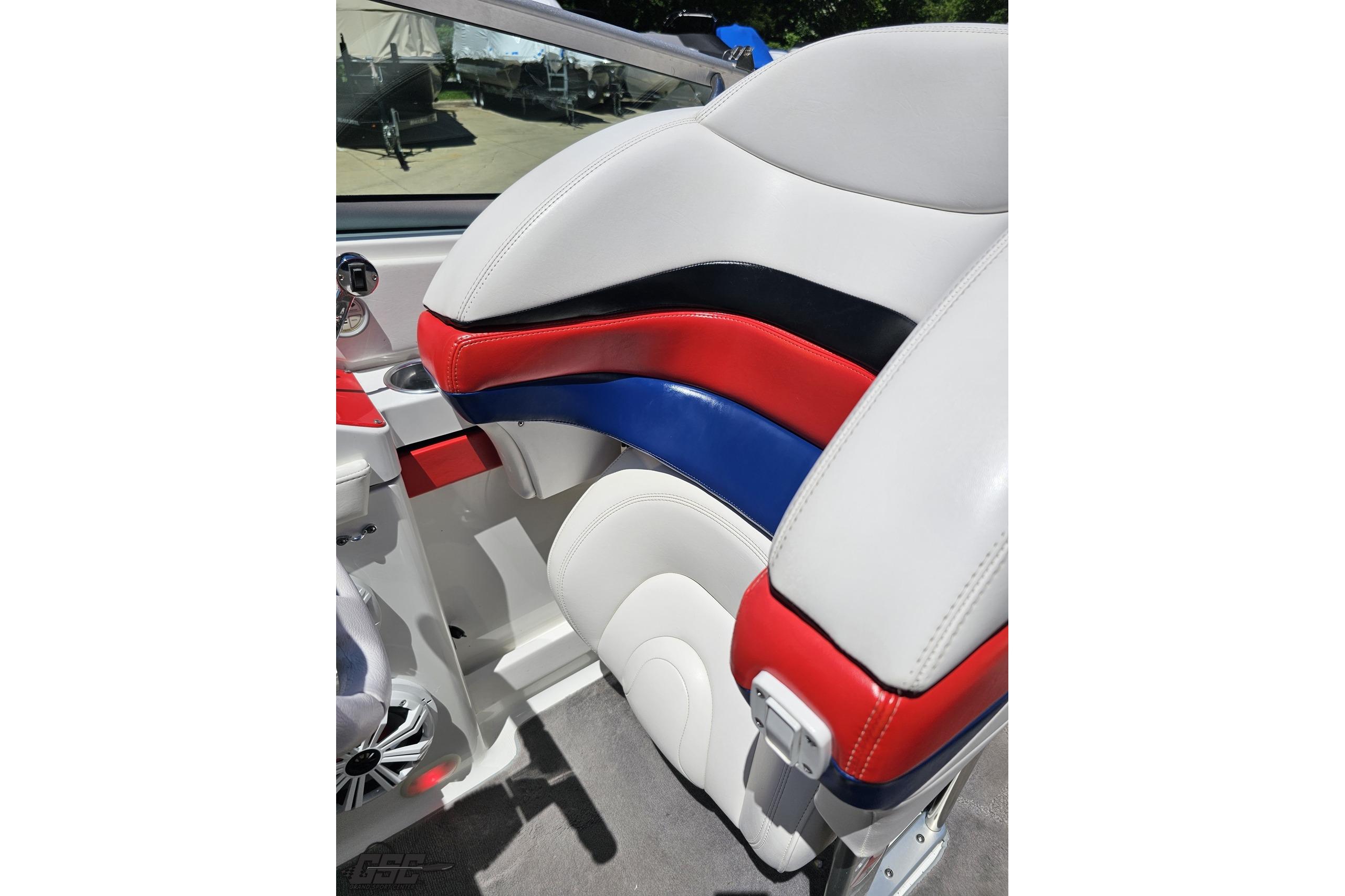 2005 Formula 271 FASTech boat seat with red, blue, and white upholstery.