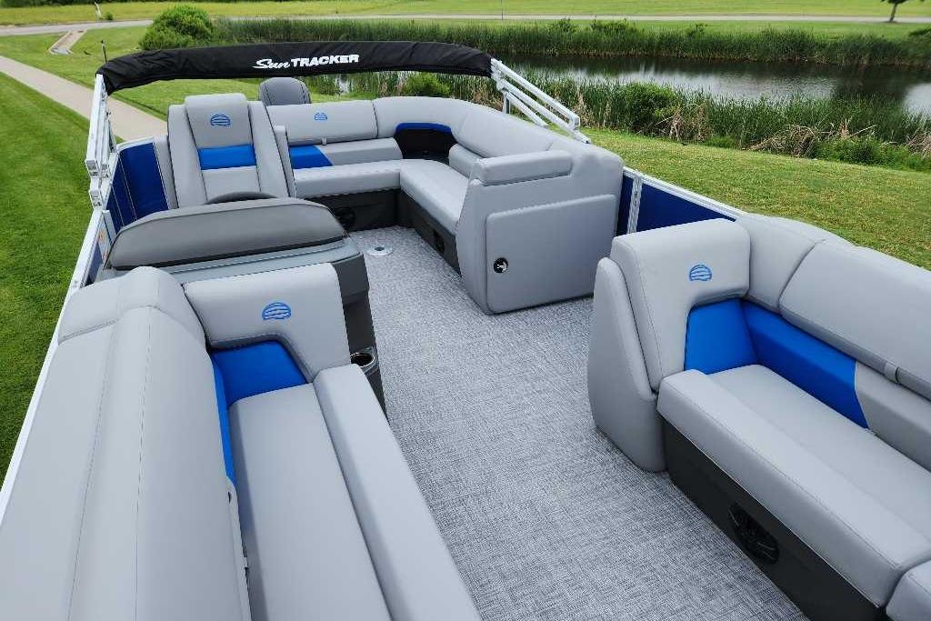 2026 Sun Tracker Party Barge 20 DLX pontoon boat with spacious seating and modern design.