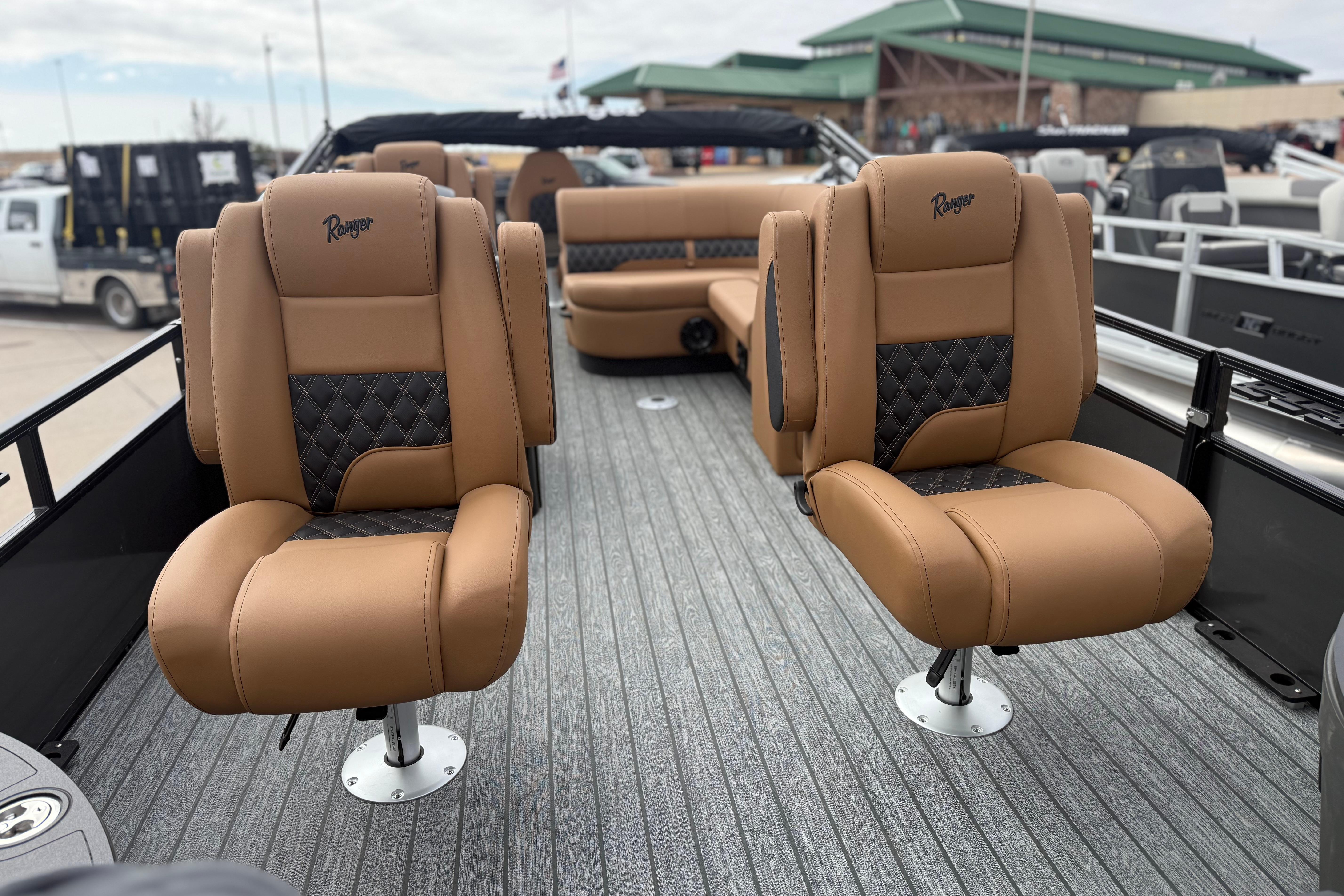2026 Ranger 220F boat interior with luxurious tan leather seats and modern design.