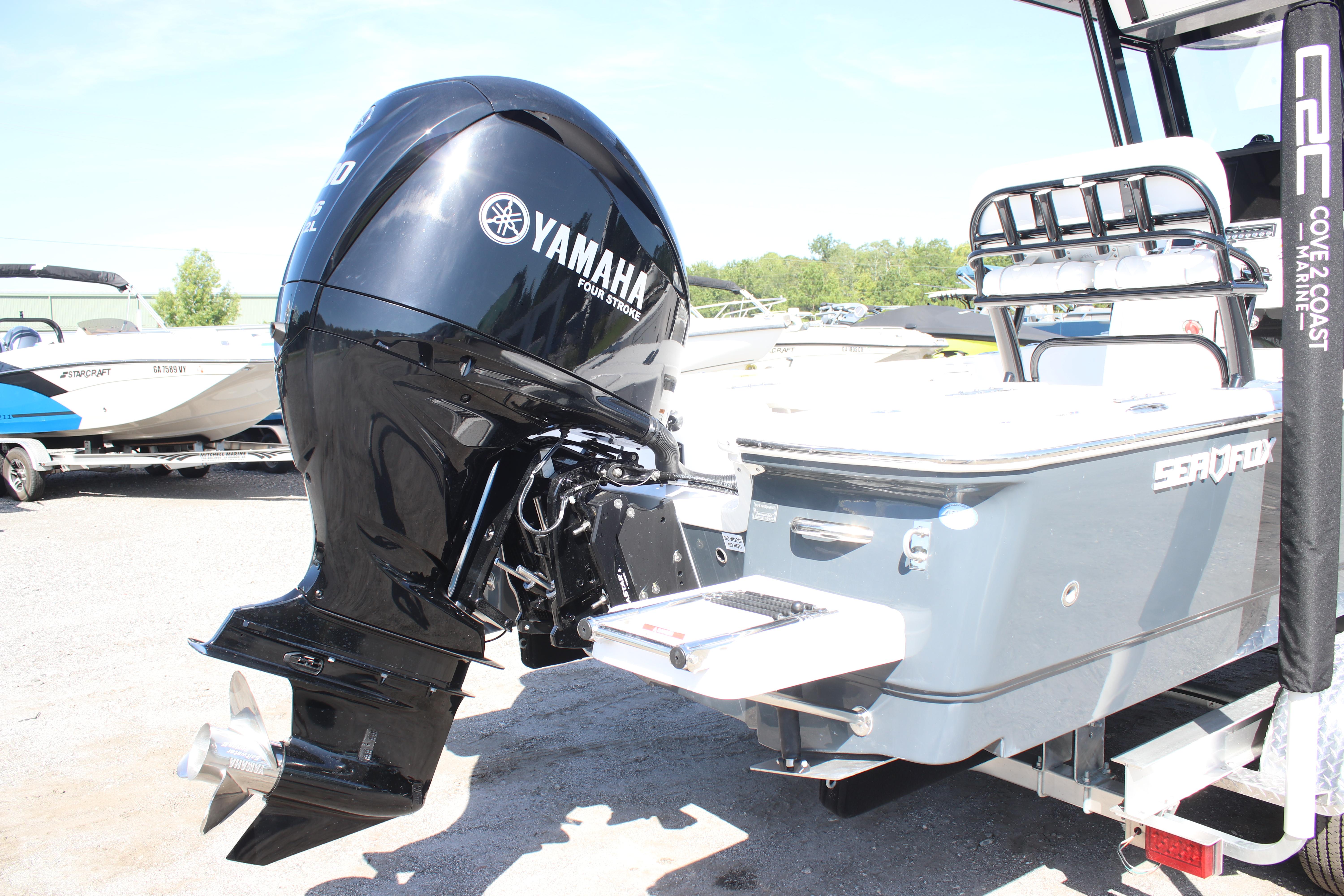 2025 Sea Fox 251 Bay Fox with Yamaha outboard motor at a marina.