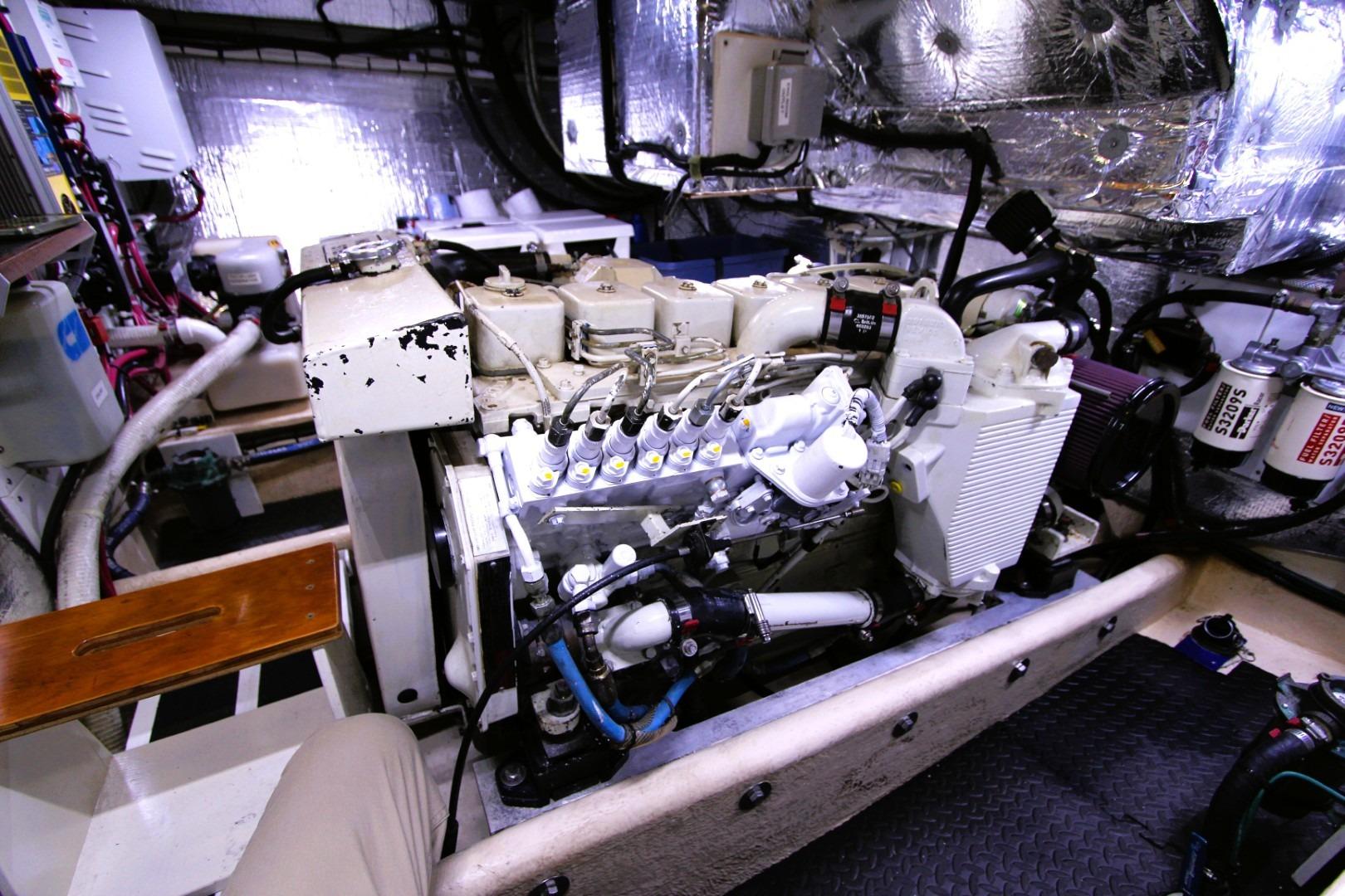 Engine room of a 2002 Nordic Tug 37, showcasing mechanical components and equipment.