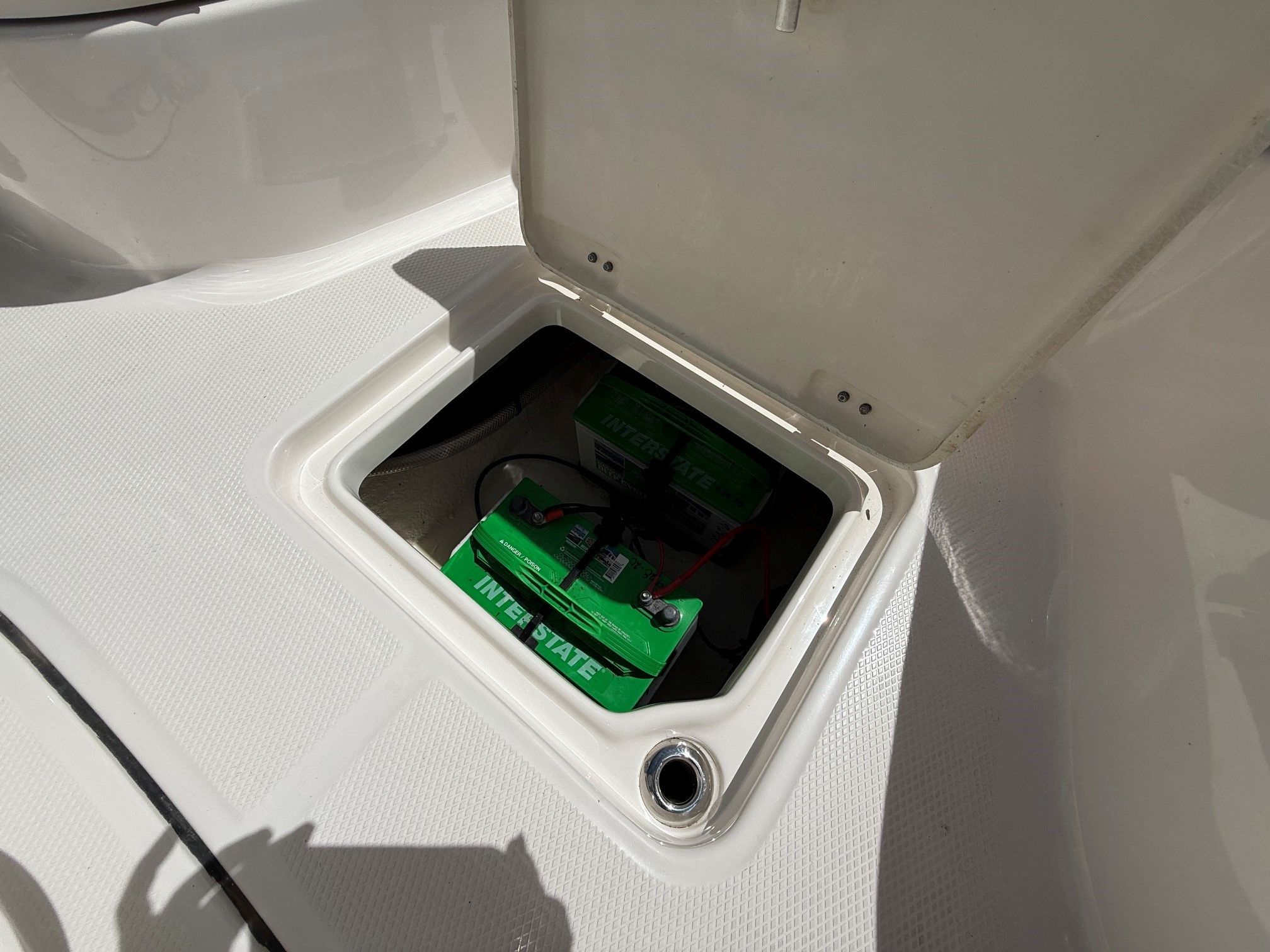 Battery compartment of a 2021 Robalo 226 Cayman boat.