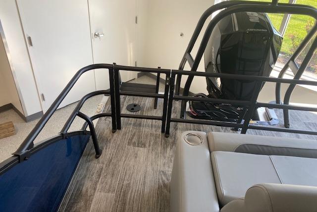 2026 Bentley Pontoons Legacy 243 Swingback interior with seating and railing details.