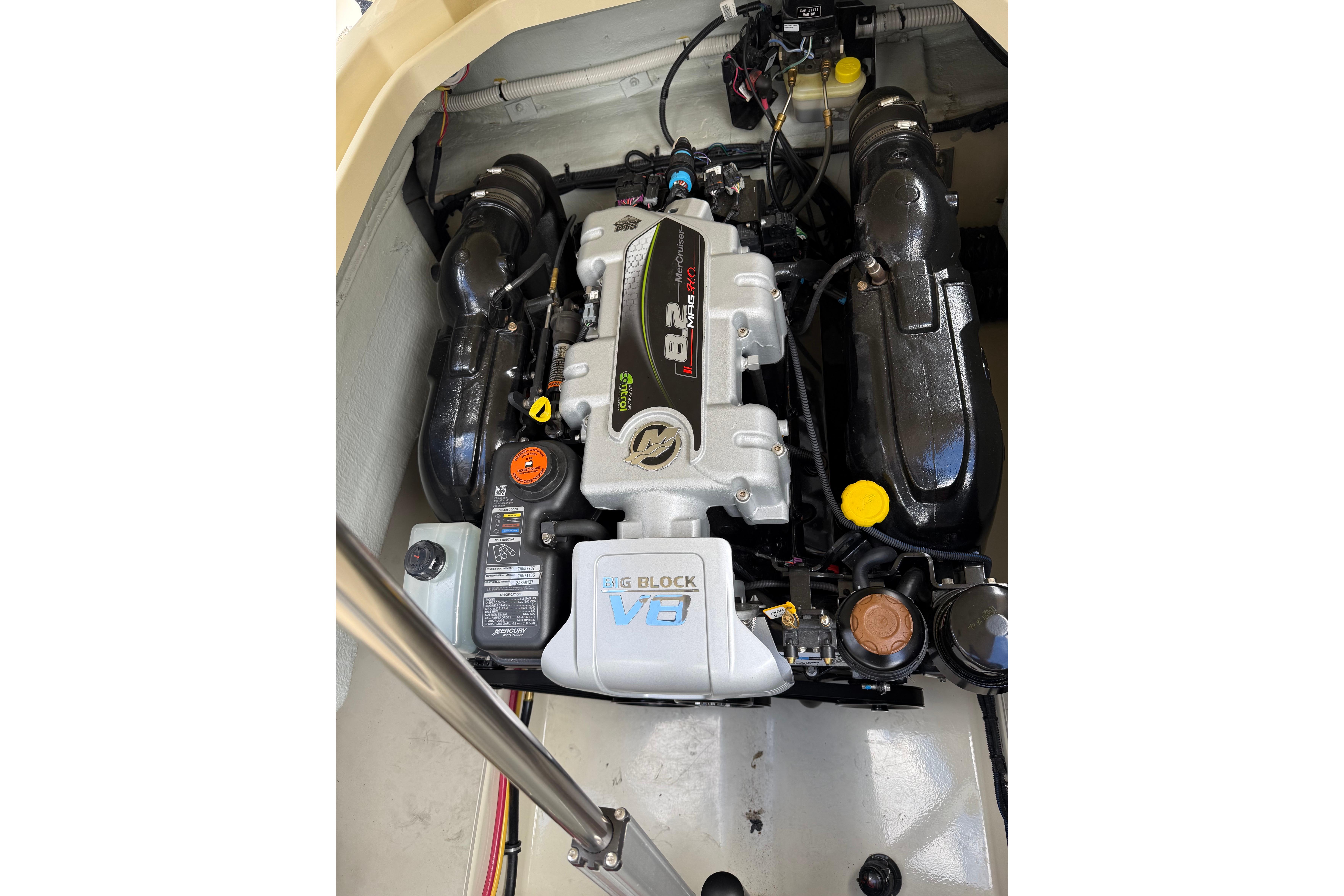Engine compartment of 2019 Chris-Craft Launch 28 GT, featuring a powerful V8 engine.