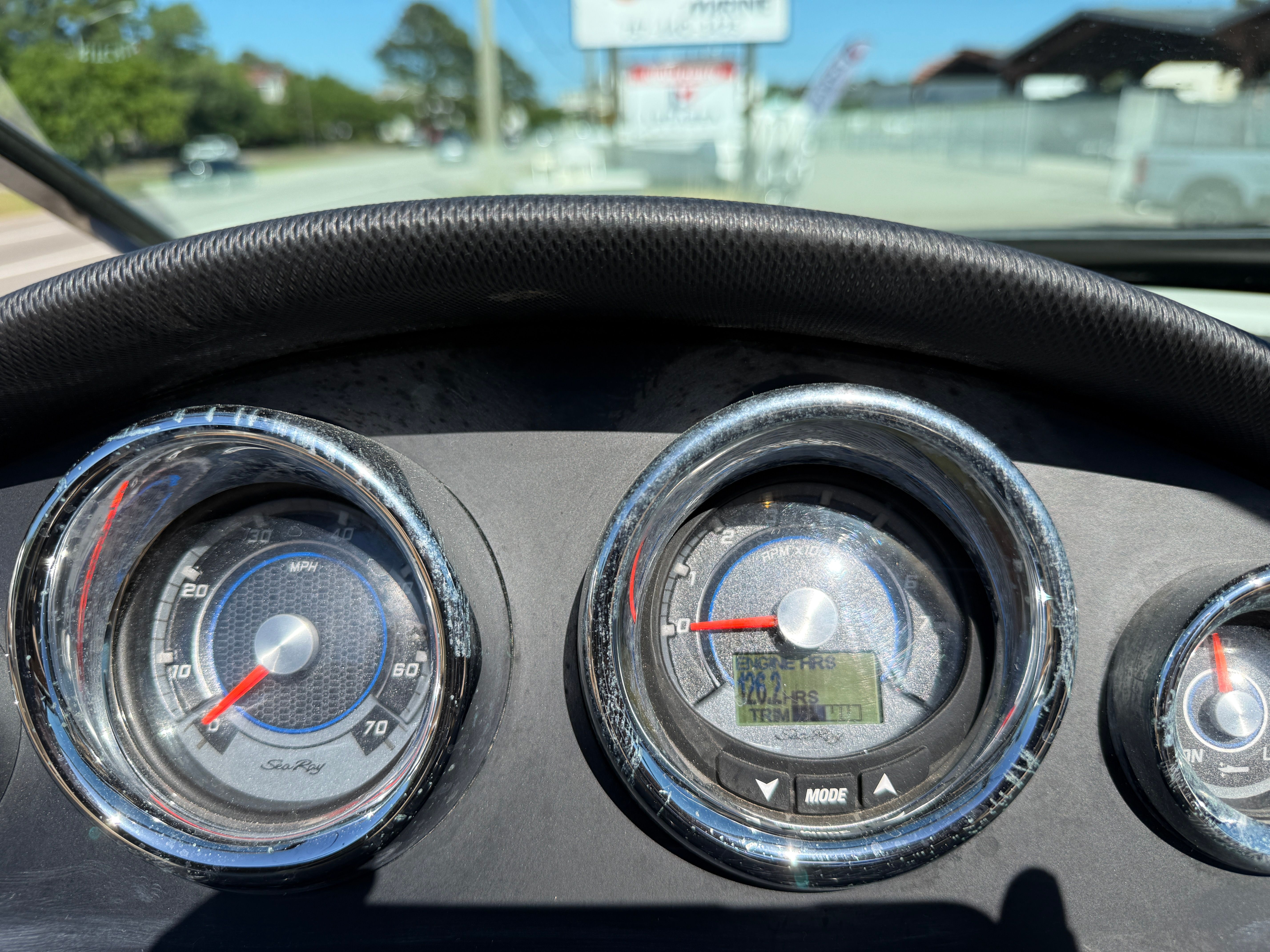 Dashboard of a 2015 Sea Ray 220 Sundeck OB boat.