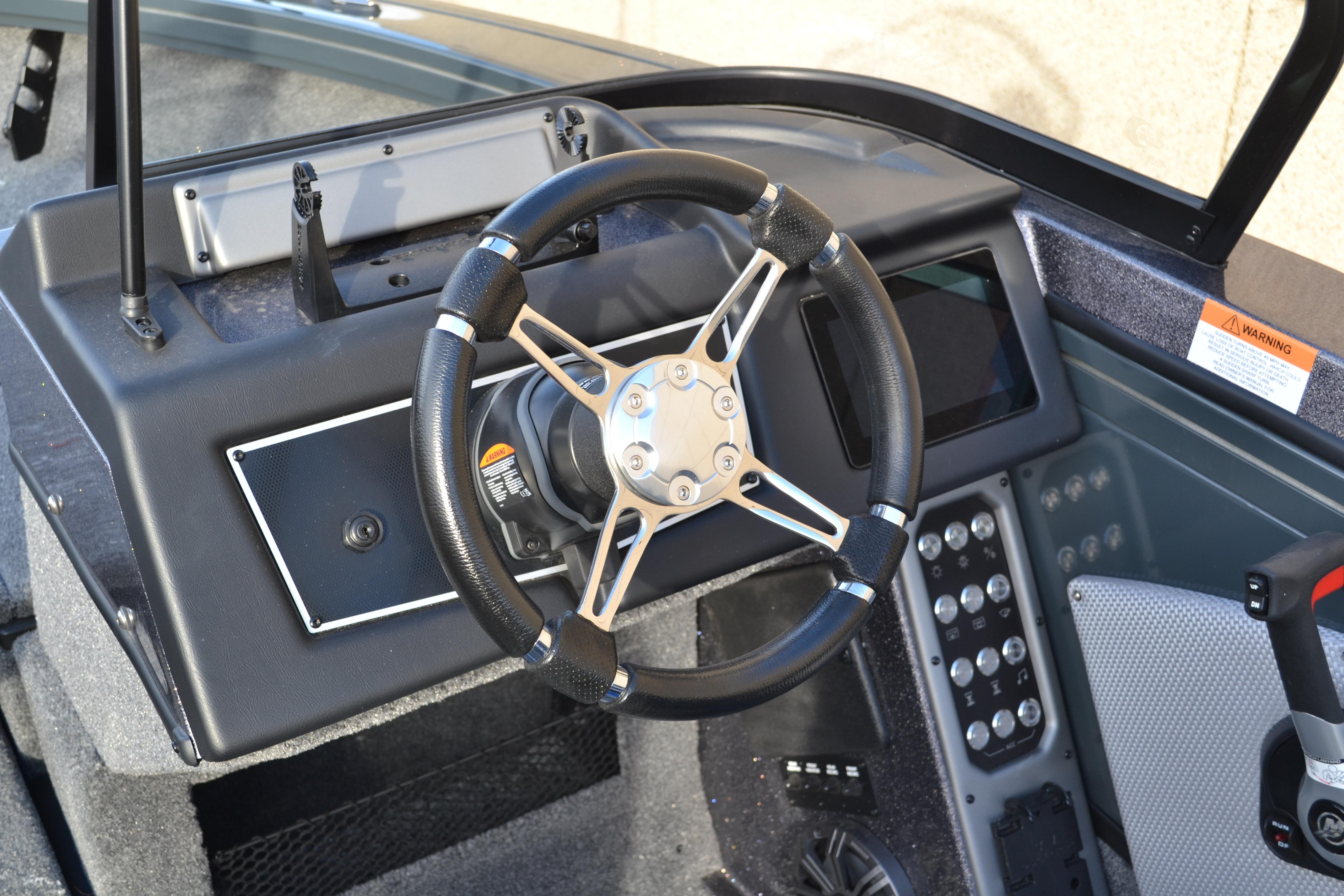 2026 Ranger VX1888 WT boat dashboard with steering wheel and control panel.