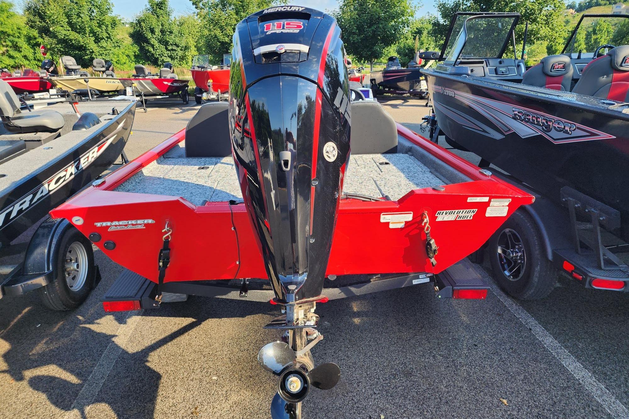 2026 Tracker Pro Team 190 boat with Mercury 115 engine, parked outdoors.