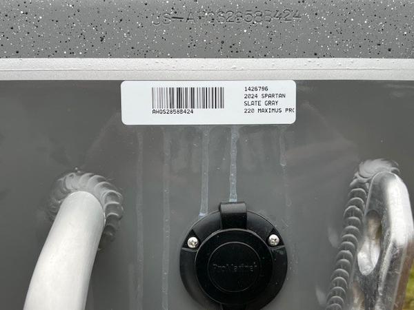 2024 Spartan 220 Maximus in slate gray with barcode and serial number.