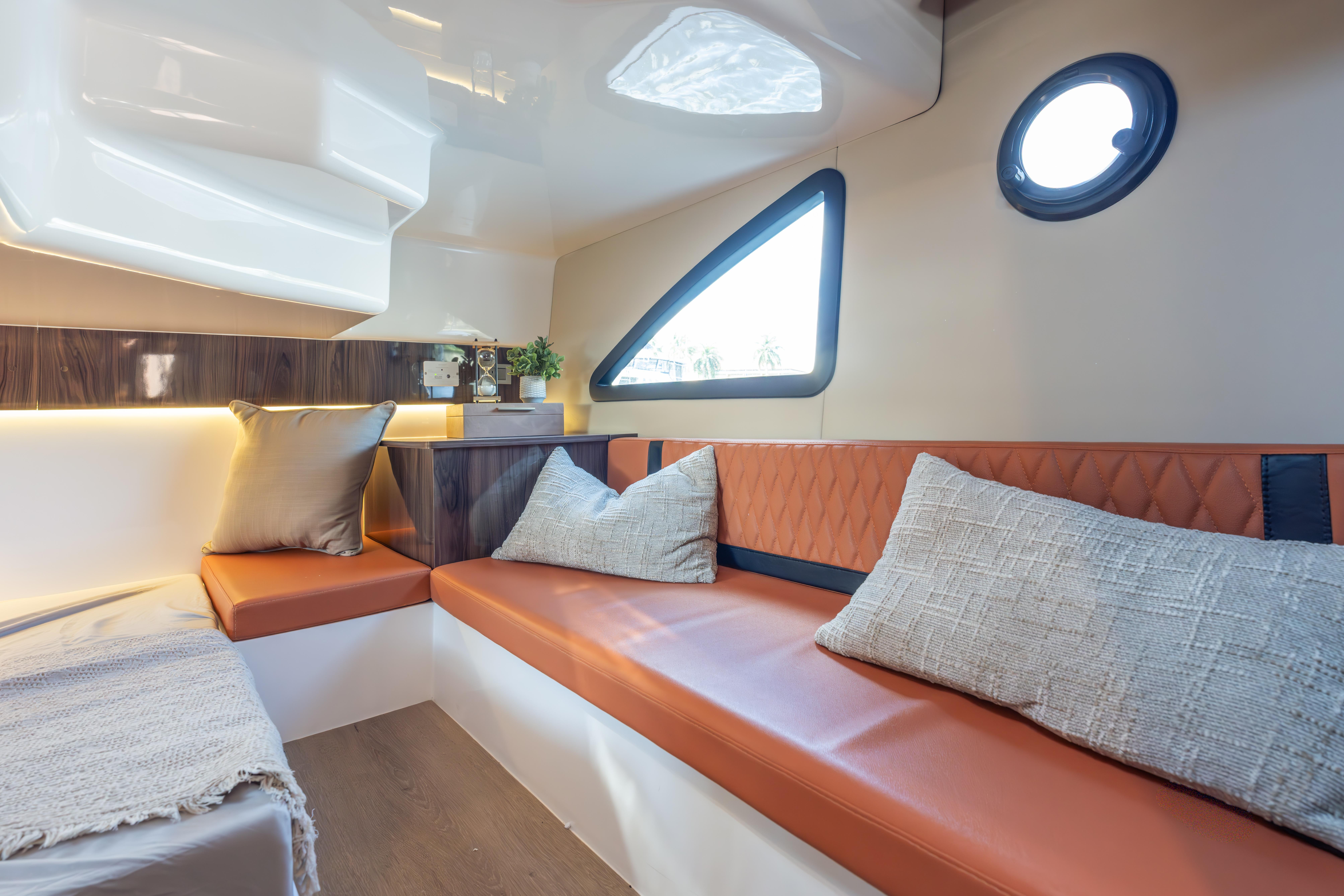 Luxurious interior of 2026 Hanover 387 yacht with plush seating and modern design.