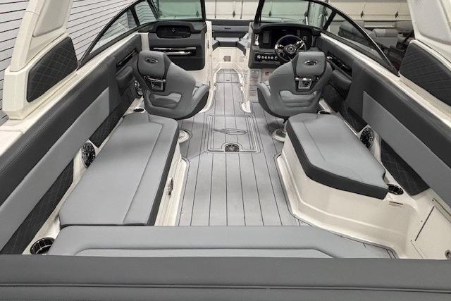 Interior of 2026 Chaparral SSX 8 boat with sleek gray seating and modern design.