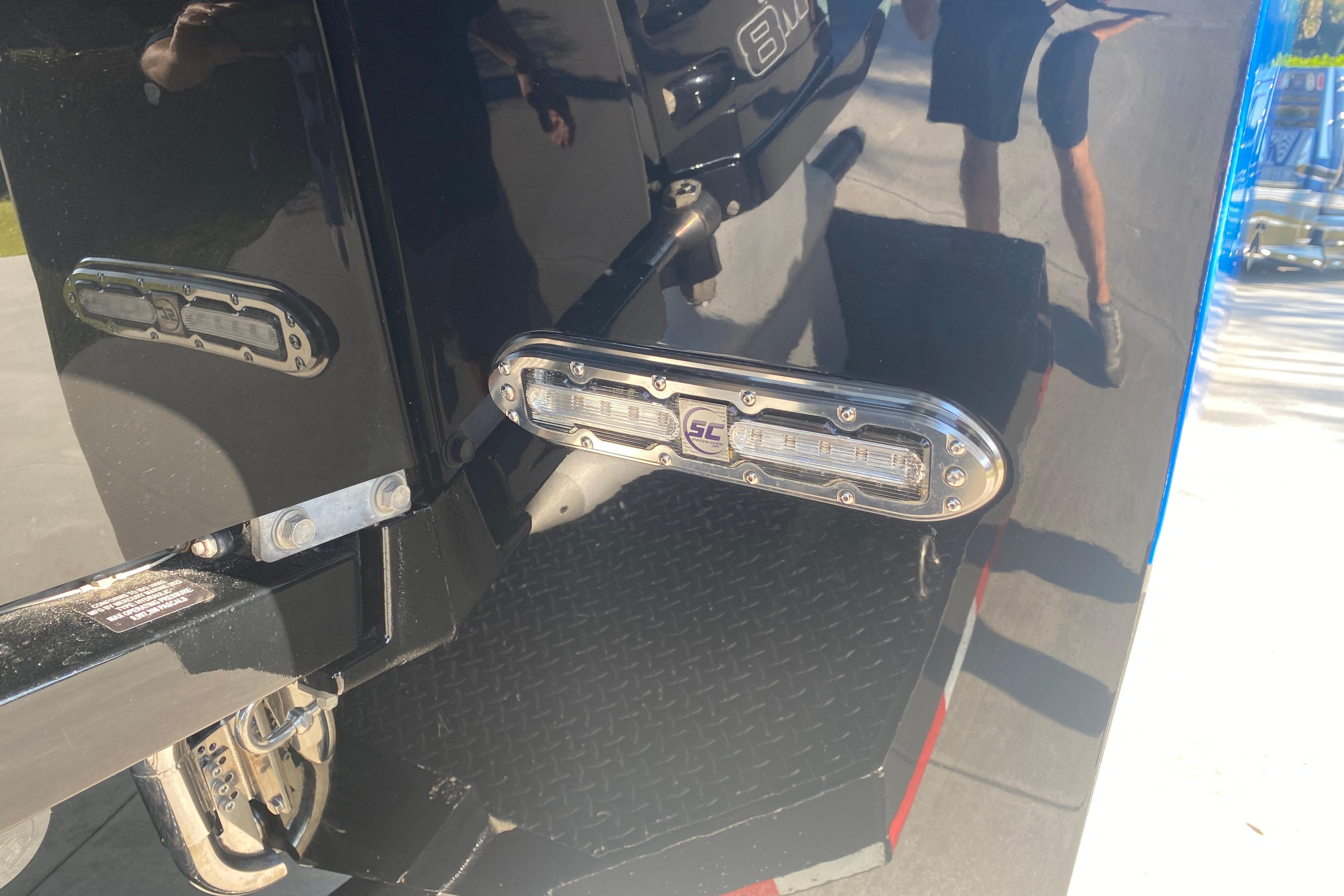 Close-up of 2016 MTI 44 RP boat's rear section with mounted lights.