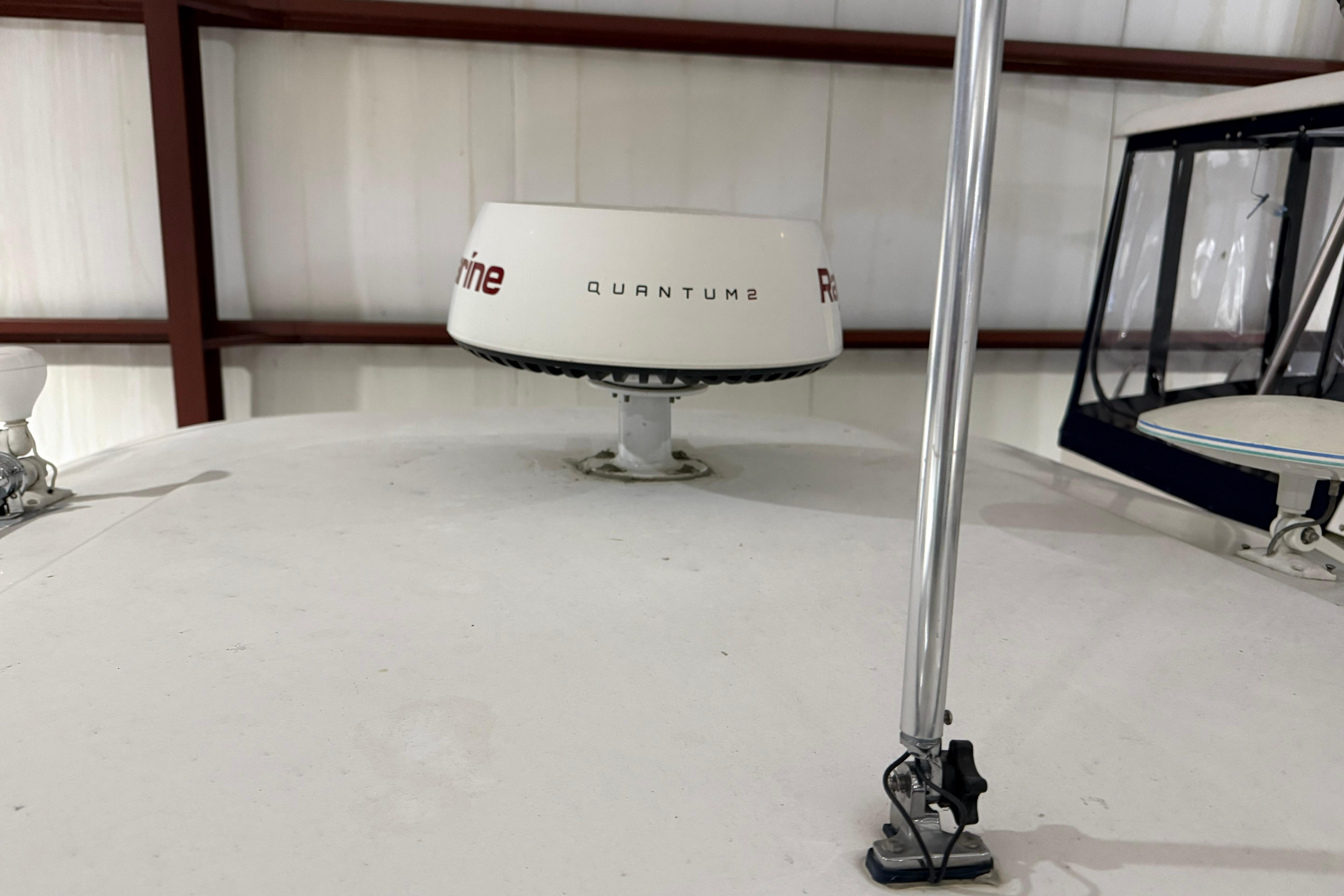 2007 Regal Commodore 3760 IO boat radar and antenna setup in storage.
