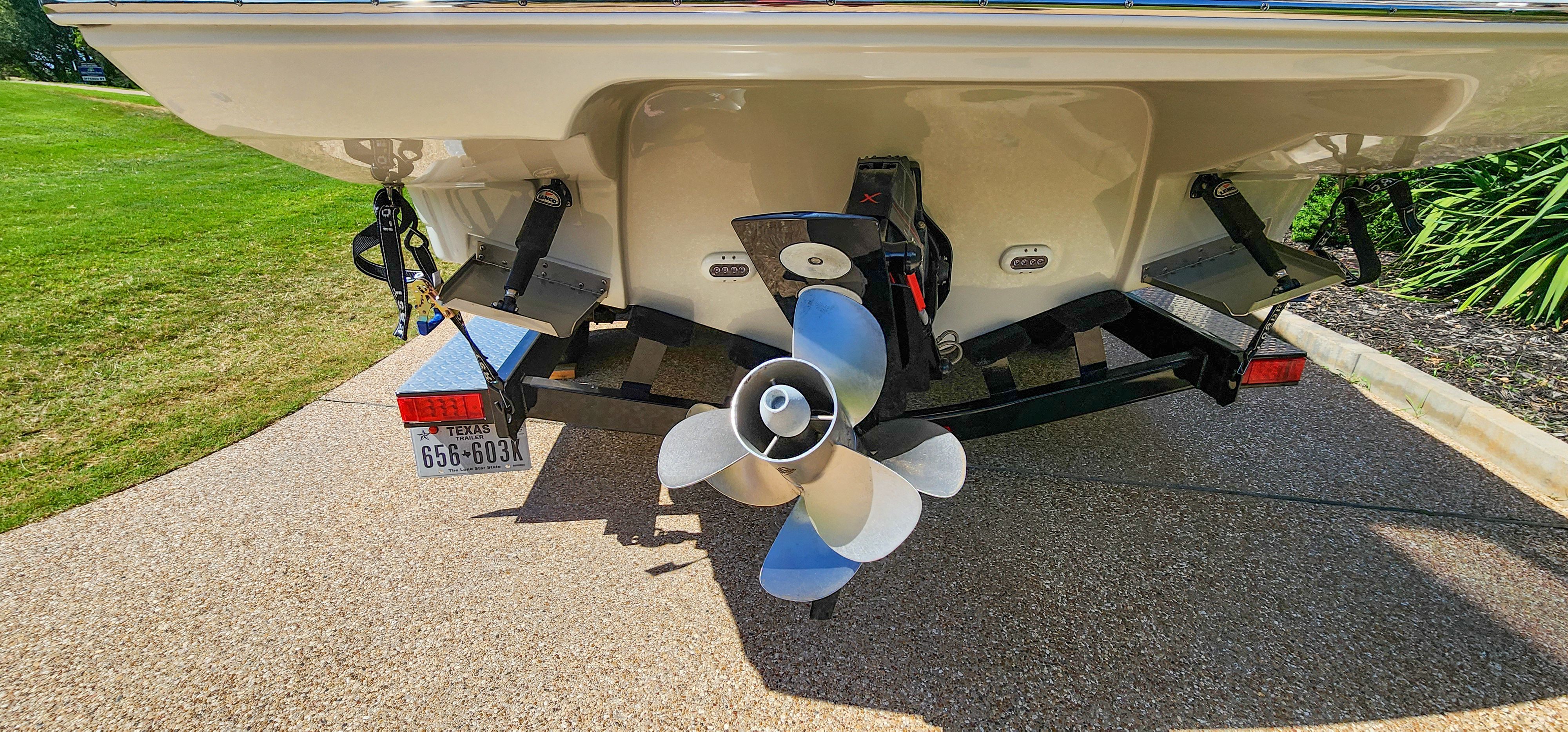The image shows the stern of a 2017 Crownline 285SS boat with a propeller.