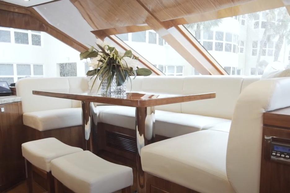 Luxurious interior of 2017 Hargrave Raised Pilothouse MY yacht with elegant seating and table.