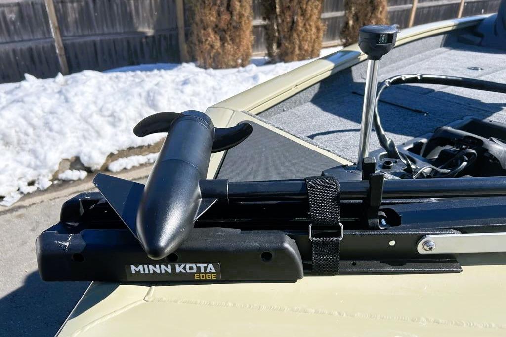 2026 Tracker Pro Team 175 boat with Minn Kota Edge trolling motor in snowy setting.