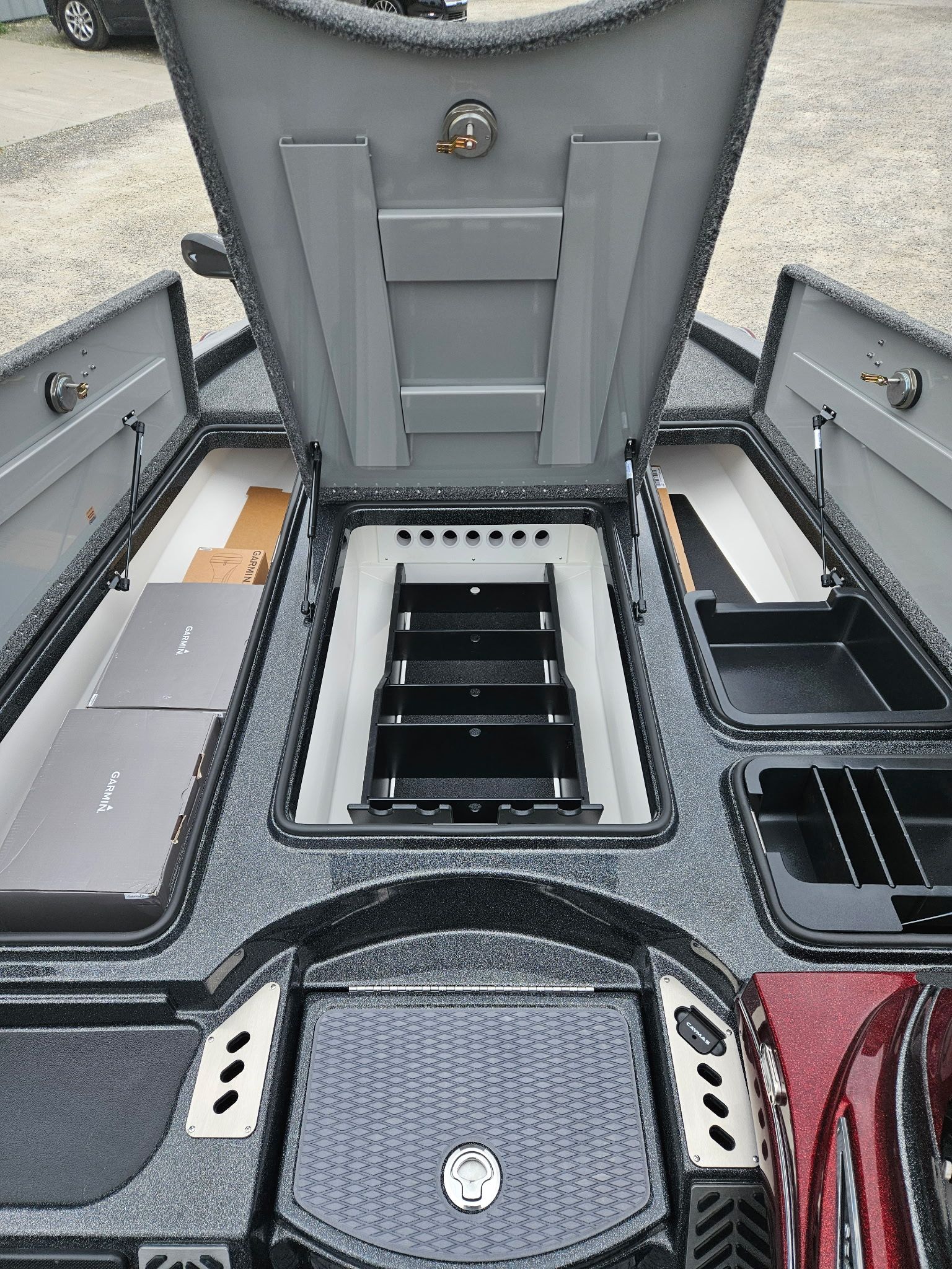 Interior view of Caymas CX 21 PRO 2027 with storage compartments.