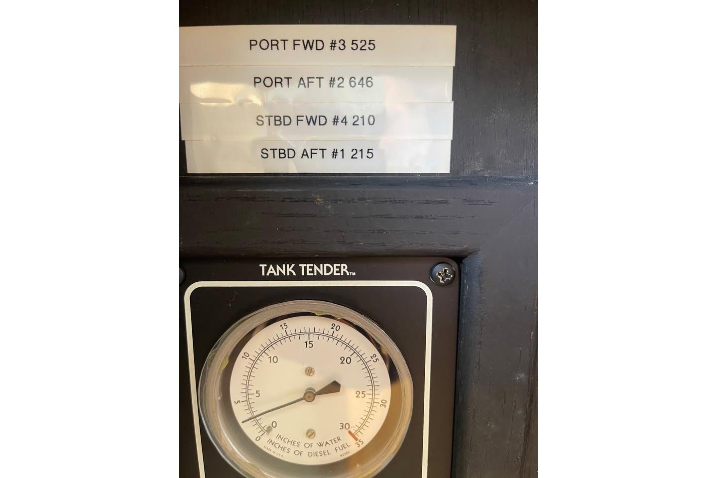 Tank Tender gauge on 1991 Hatteras 70 Cockpit Motor Yacht dashboard.