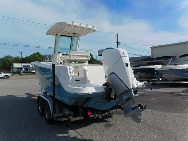2025 Sailfish 232 CC boat on trailer, featuring a powerful outboard motor.