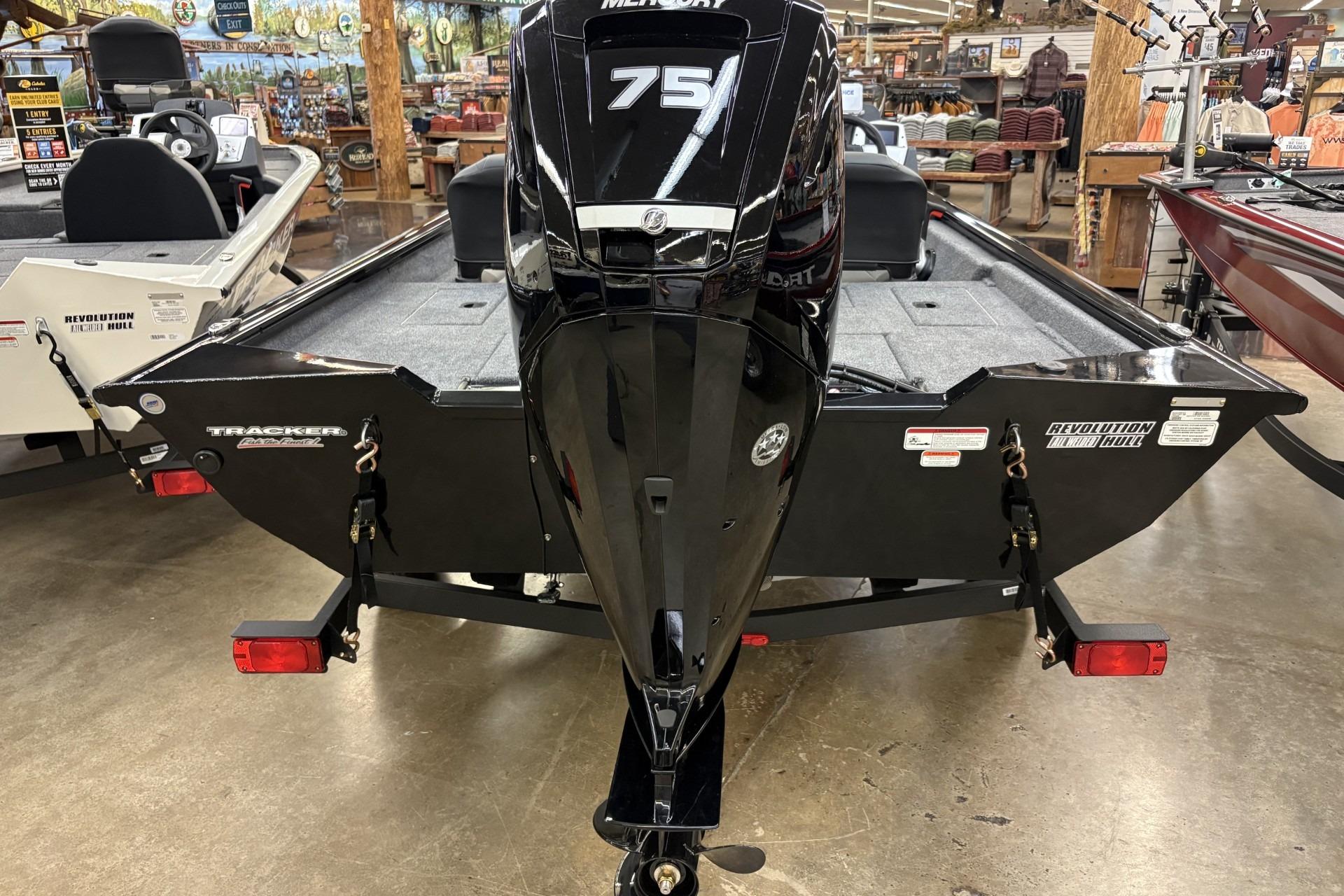 2026 Tracker Pro Team 175 Crappie Edition boat with Mercury 75 engine, displayed indoors.