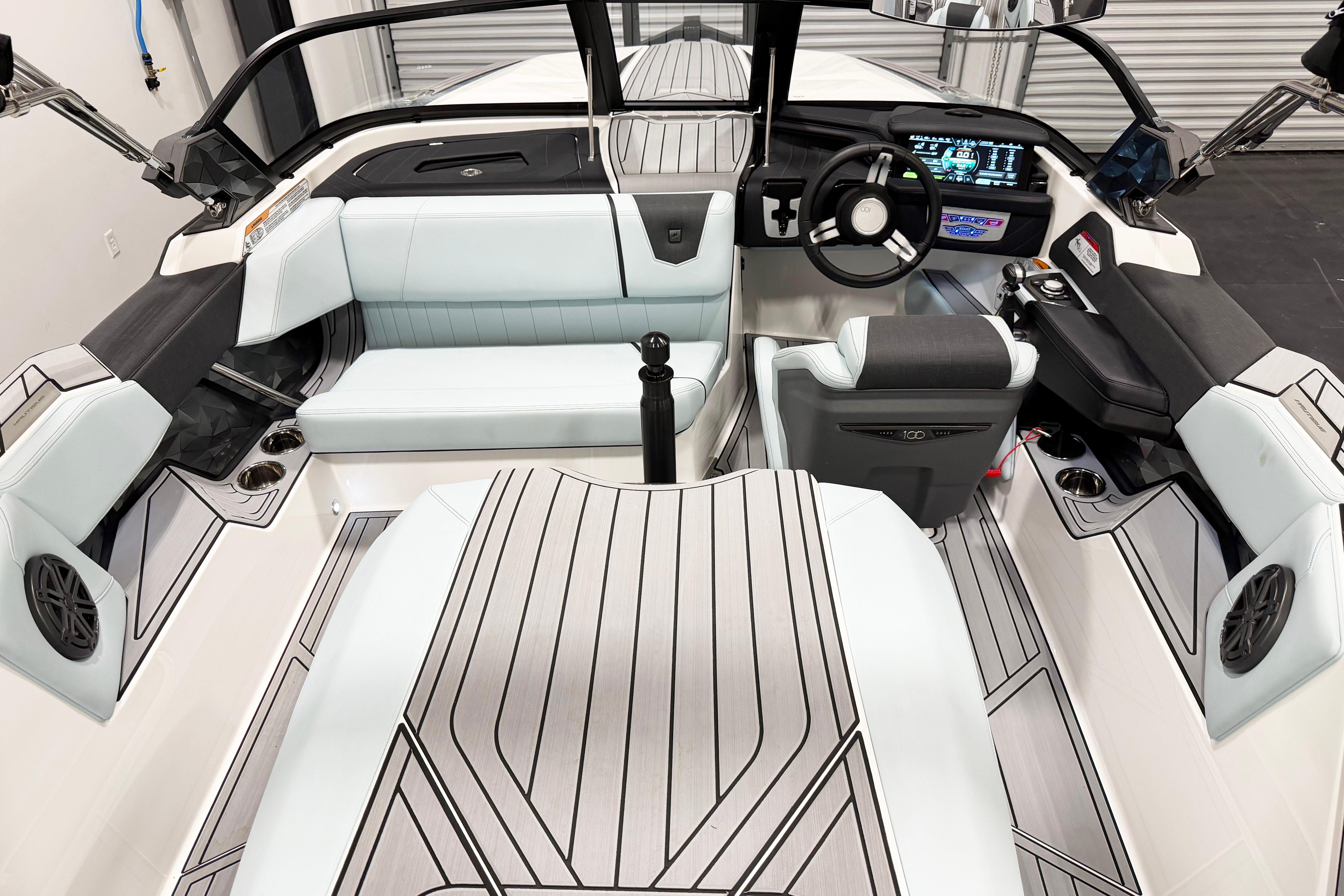 2025 Nautique Ski Nautique boat interior with modern dashboard and seating.