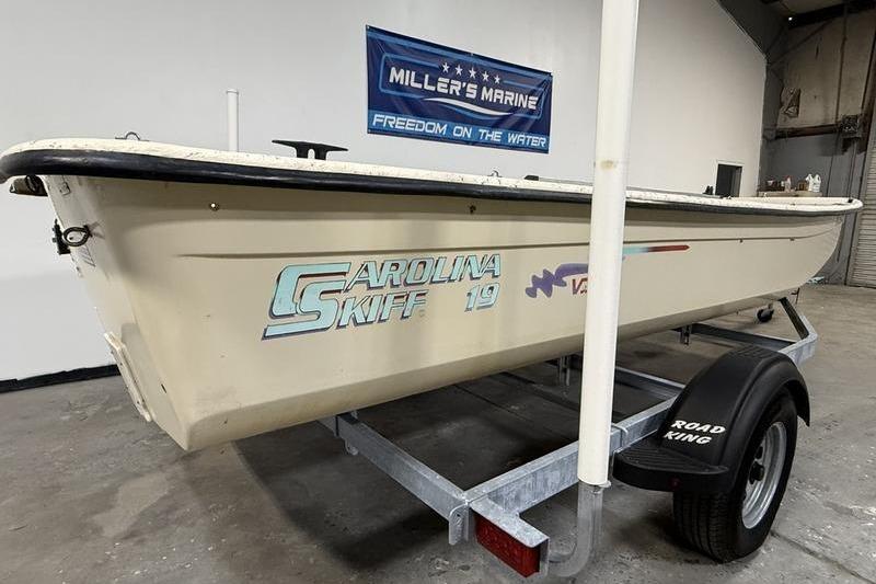 1998 Carolina Skiff 1965 V boat on trailer in showroom.