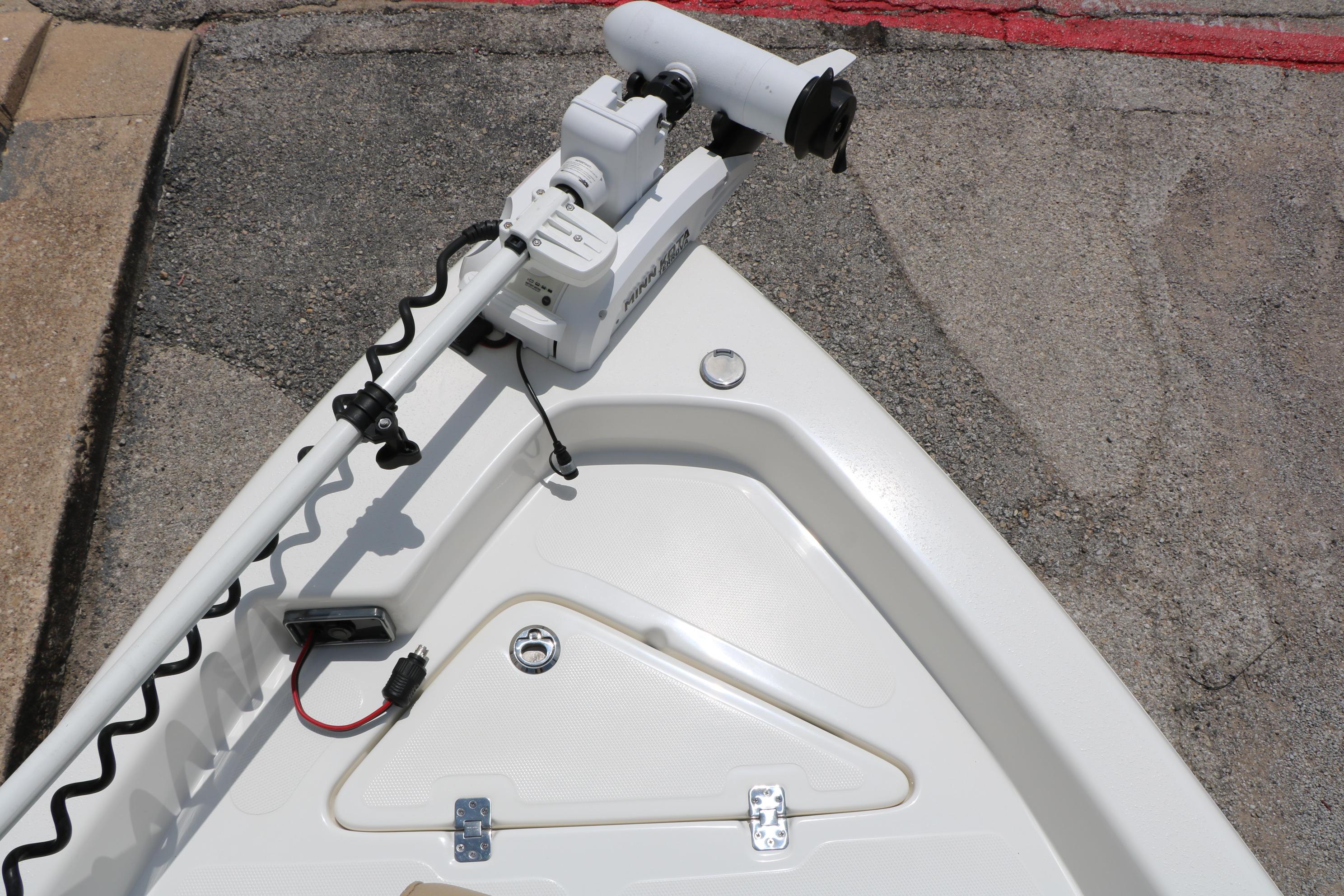 2020 NauticStar 2140 Sport boat bow with mounted trolling motor.