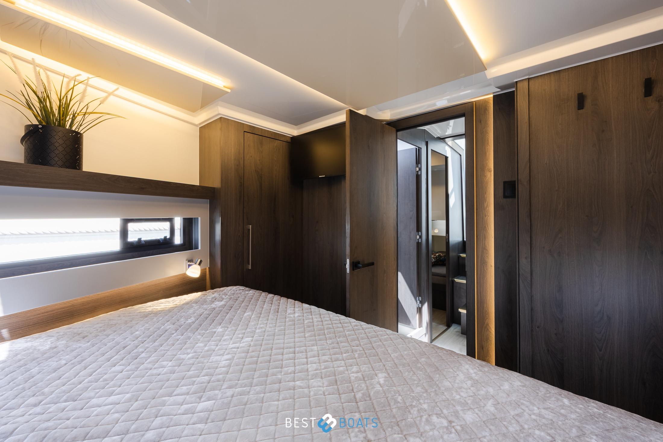 Luxurious bedroom interior of 2023 Cobra Yachts Futura 36 Premium Fly, featuring modern design elements.