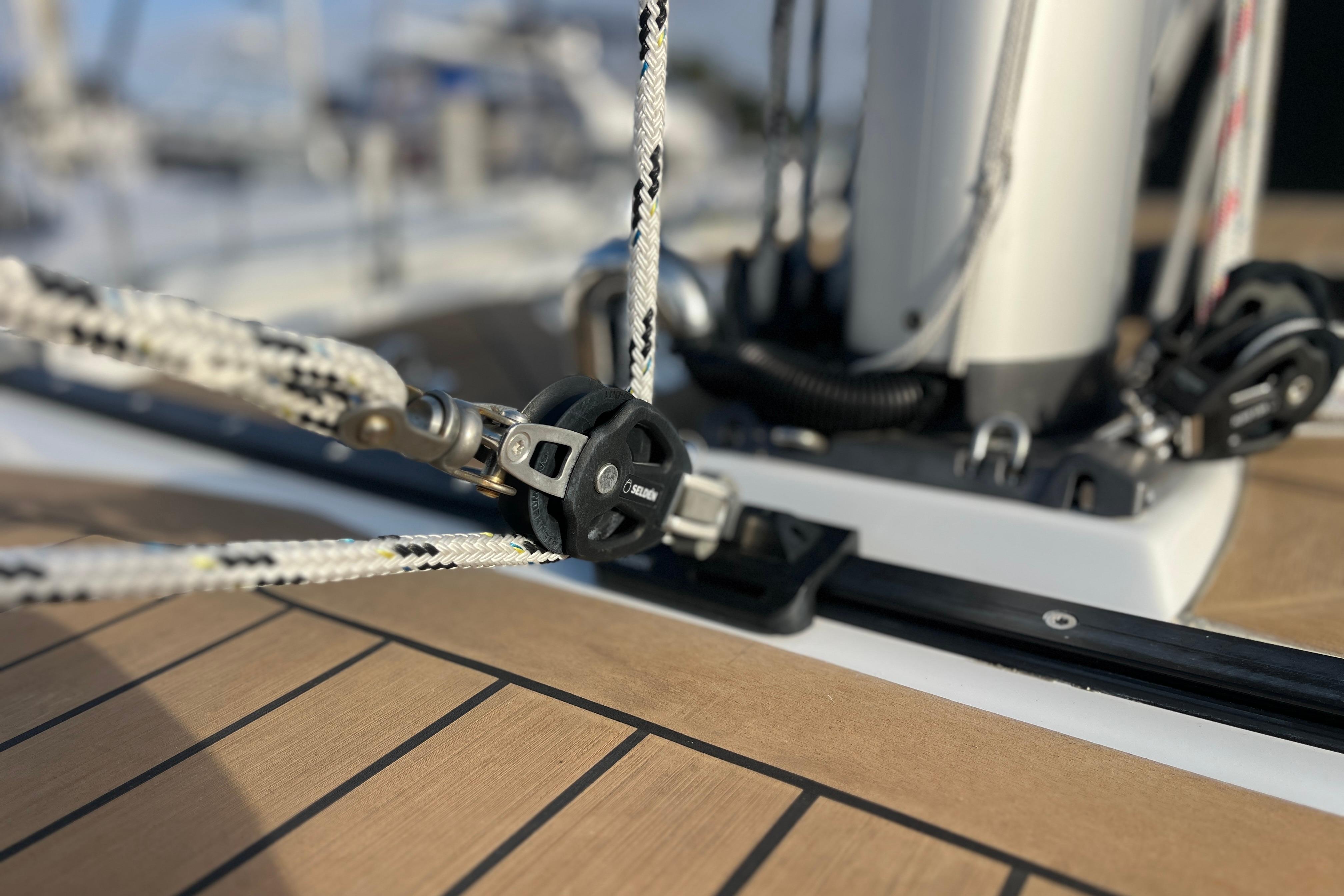 Close-up of rigging on a 2025 Hanse 360 sailboat deck.