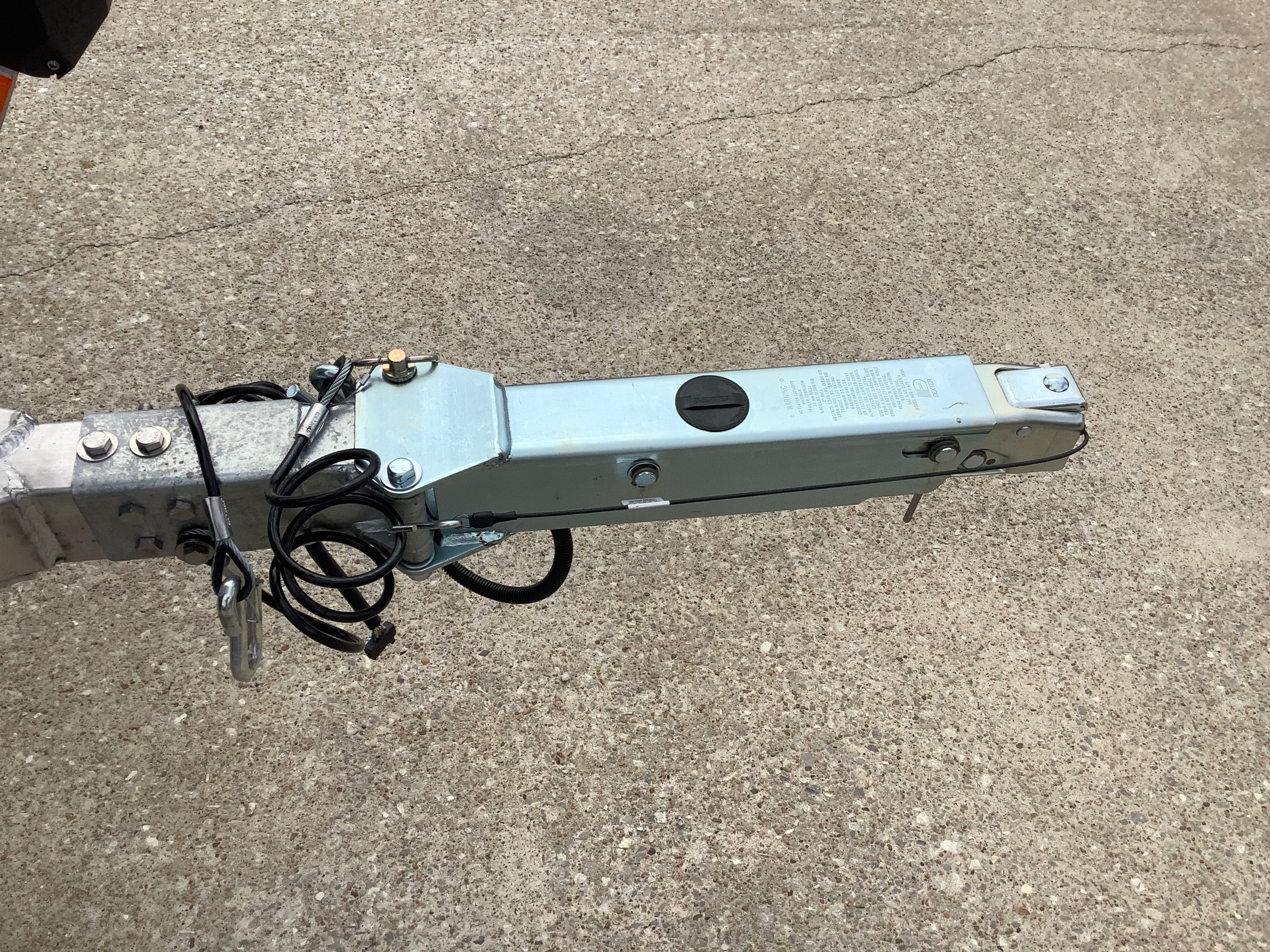 Trailer hitch of Xpress H22B Bay 2026 on concrete surface.