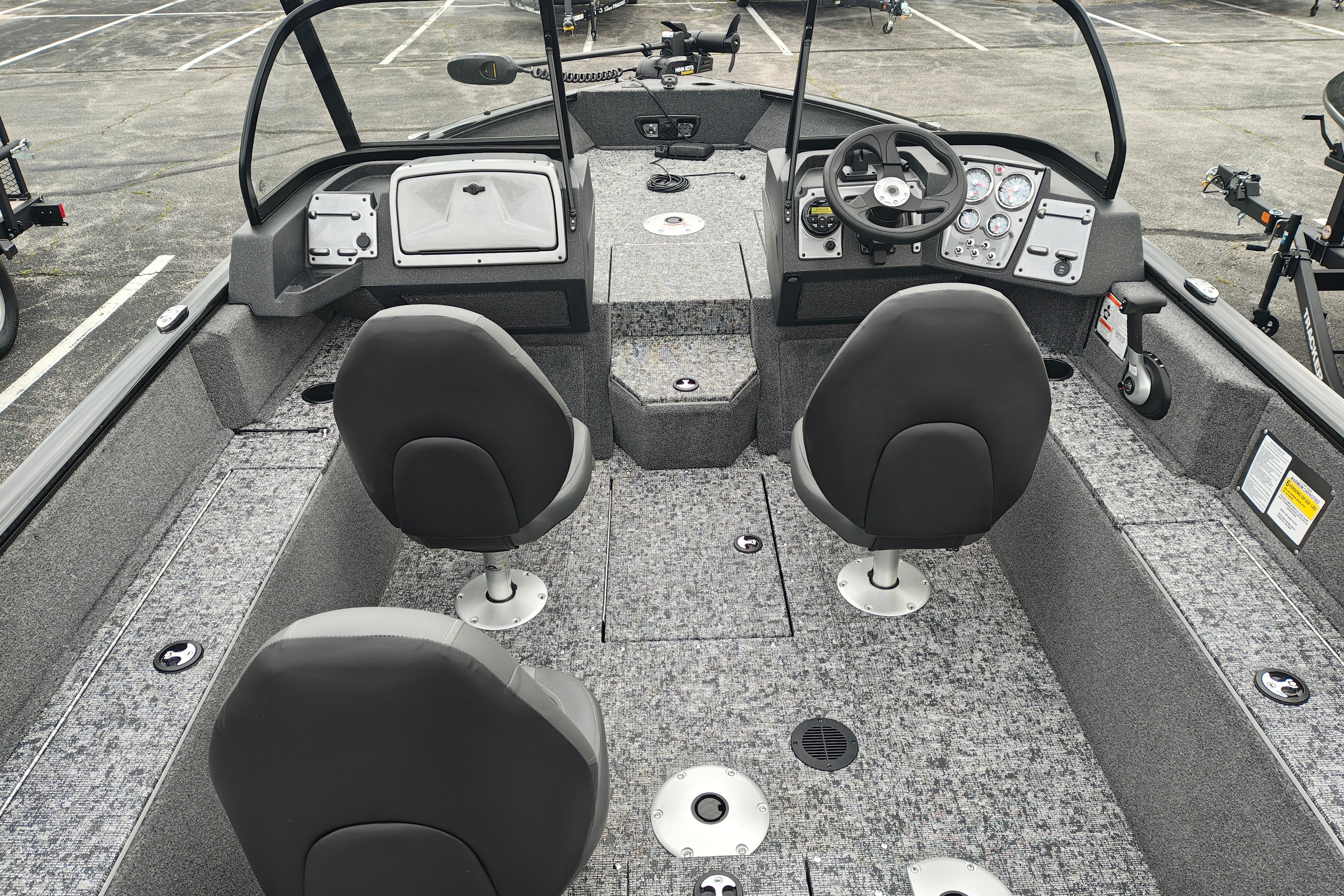 2026 Tracker Pro Guide V-175 WT boat interior with seating and control panel.
