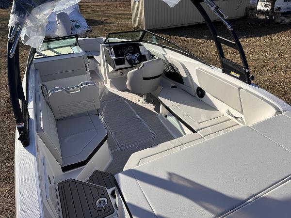 2025 Sea Ray SPX 230 OB boat interior with modern seating and steering console.